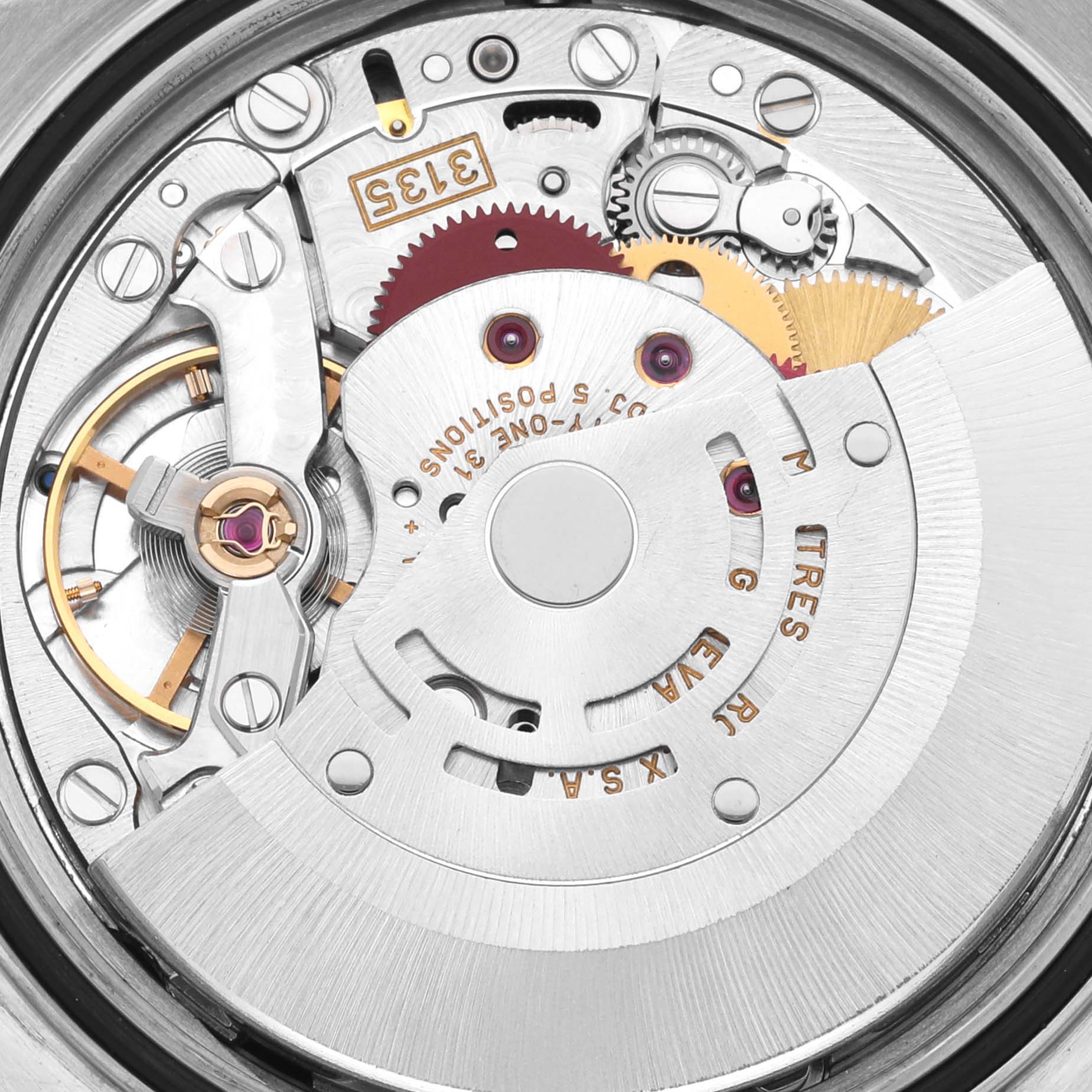 The image shows the movement components of a Rolex Datejust 16233 Men's Steel and Gold (two tone) Black Dial 16233 Men's Steel and Gold (two tone) Black Dial watch, focusing on gears and mechanisms from a top-down angle.