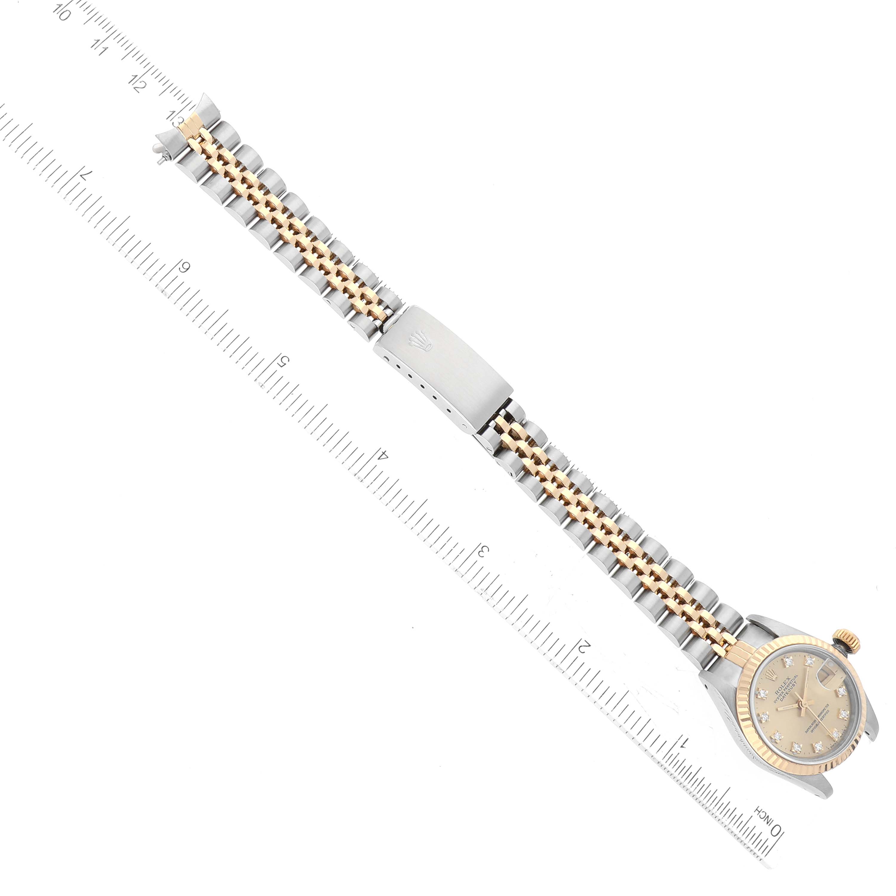 The image shows a top view of the Rolex Datejust 69173 Women's Steel and Gold (two tone) Champagne Dial 69173 Women's Steel and Gold (two tone) Champagne Dial watch, including the face, clasp, and bracelet.