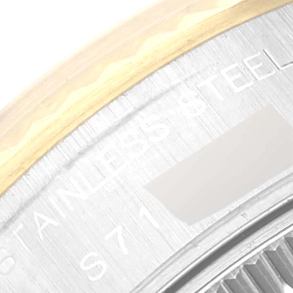 This close-up image shows the bezel and part of the rehaut of a Rolex Datejust 69173 Women's Steel and Gold (two tone) Champagne Dial 69173 Women's Steel and Gold (two tone) Champagne Dial, highlighting the "STAINLESS STEEL" engraving.
