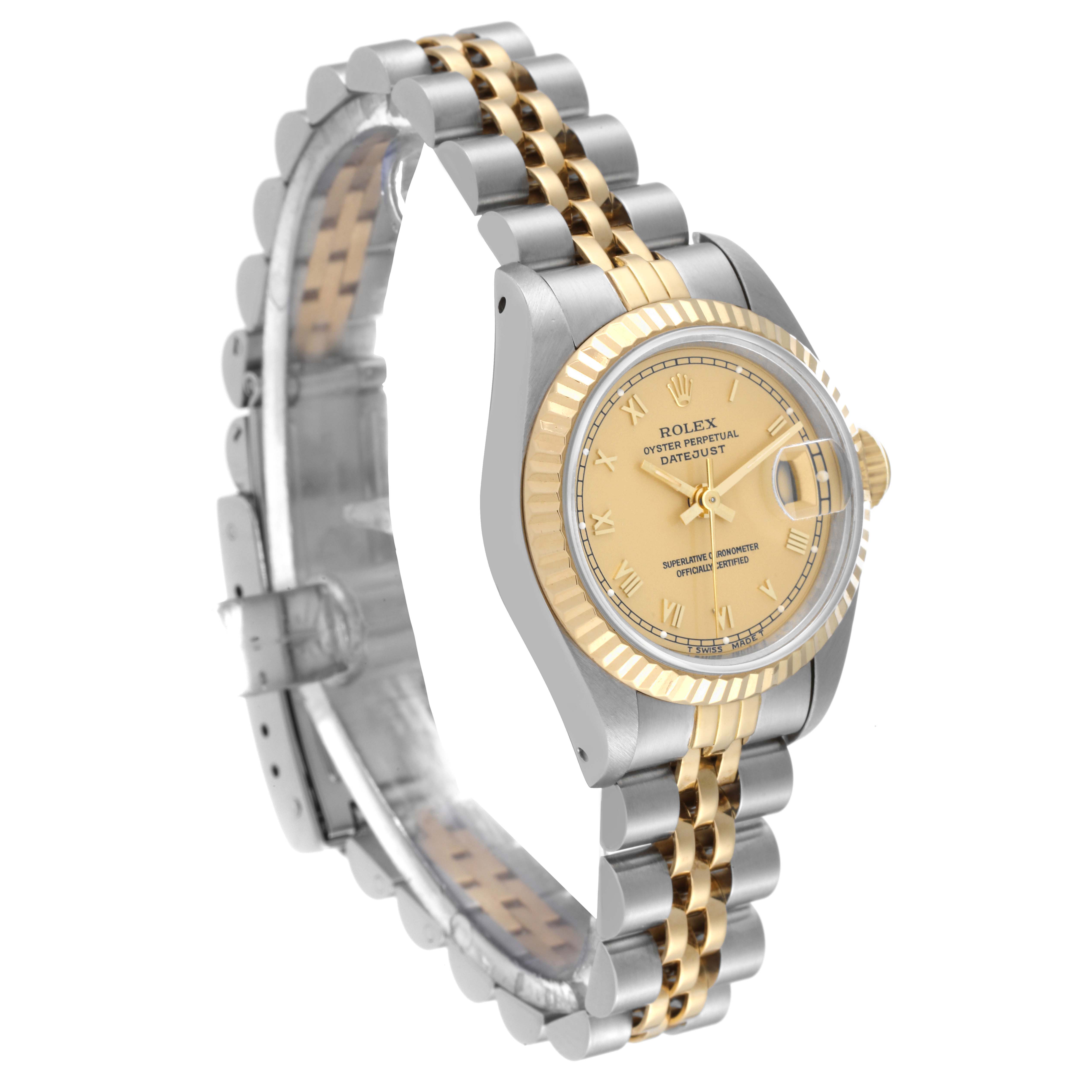 The image shows a side angle of a Rolex Datejust 69173 Women's Steel and Gold (two tone) Champagne Dial 69173 Women's Steel and Gold (two tone) Champagne Dial watch highlighting its two-tone bracelet, fluted bezel, and champagne dial.