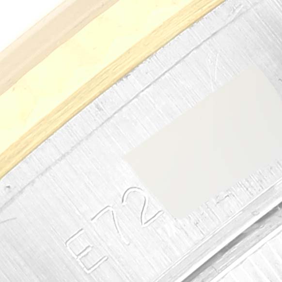 This image shows a close-up of the side engraving and partial bezel of a Rolex Datejust 69173 Women's Steel and Gold (two tone) Champagne Dial 69173 Women's Steel and Gold (two tone) Champagne Dial watch.