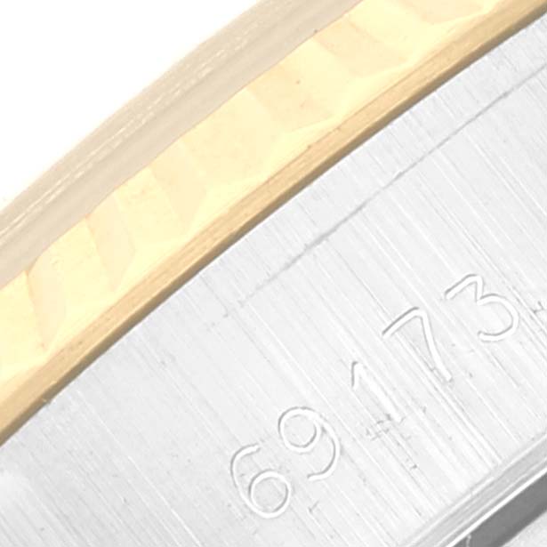 This close-up angle shows the model number and part of the bezel of a Rolex Datejust 69173 Women's Steel and Gold (two tone) Champagne Dial 69173 Women's Steel and Gold (two tone) Champagne Dial watch.