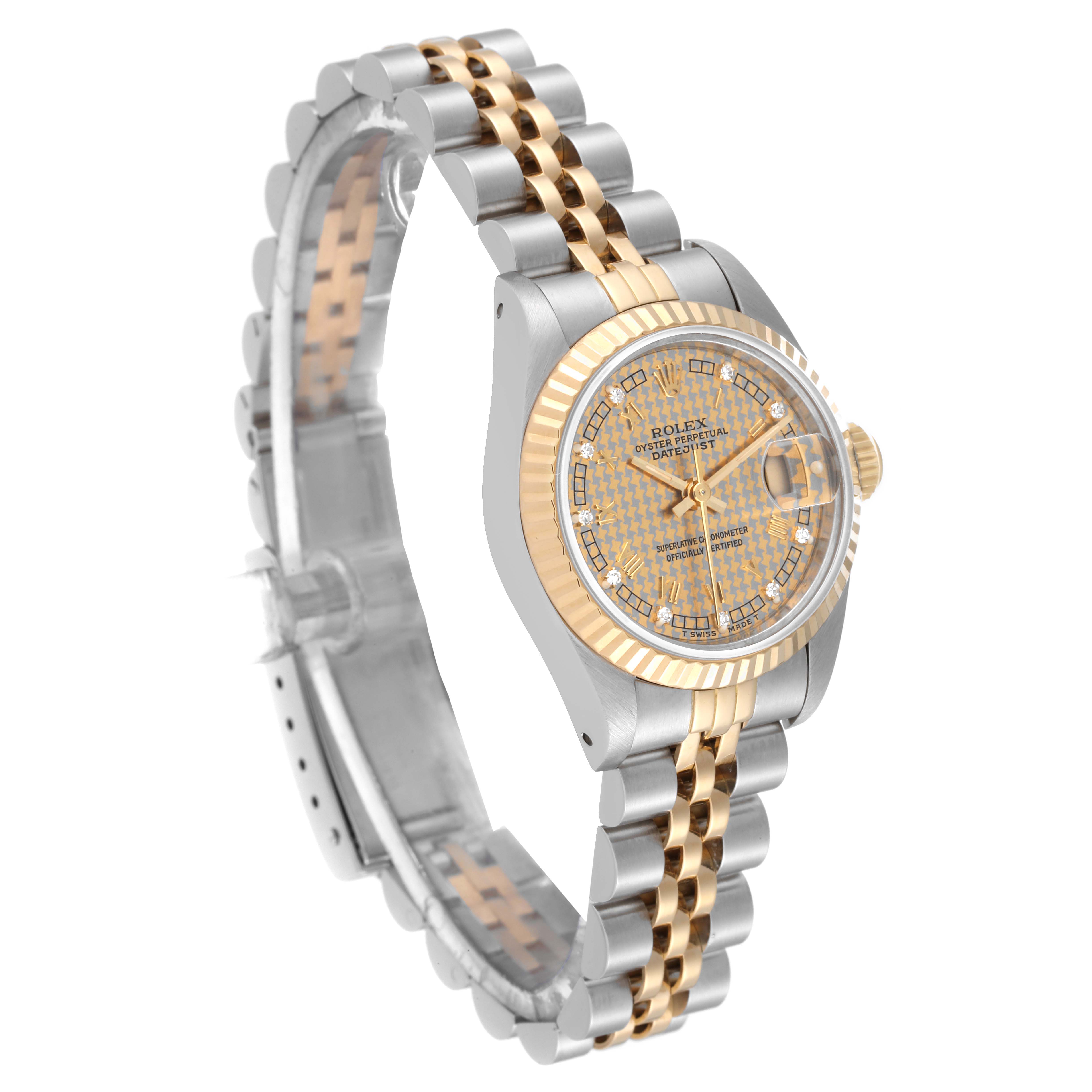 This image shows a Rolex Datejust 69173 Women's Steel and Gold (two tone) Champagne Dial 69173 Women's Steel and Gold (two tone) Champagne Dial watch from an angled perspective, highlighting its two-tone bracelet, dial, and bezel.