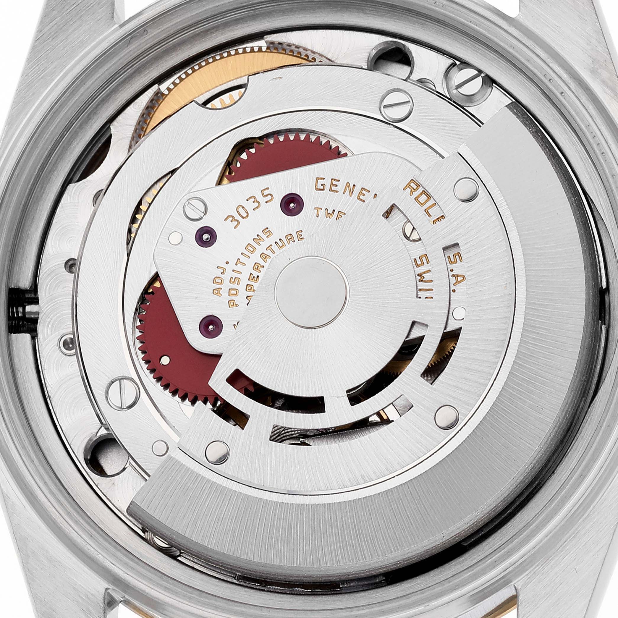 This image shows a close-up of the internal mechanism and gears of a Vintage Collection Rolex watch model 3035.