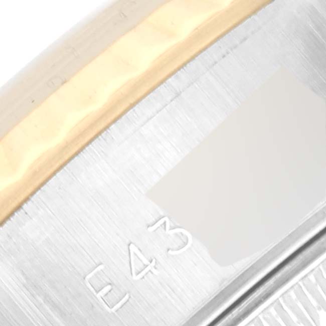 The image shows a close-up of the case side and the bezel of a Rolex Datejust 69173G Women's Steel and Gold (two tone) White Dial 69173G Women's Steel and Gold (two tone) White Dial watch, highlighting the model number engravings.