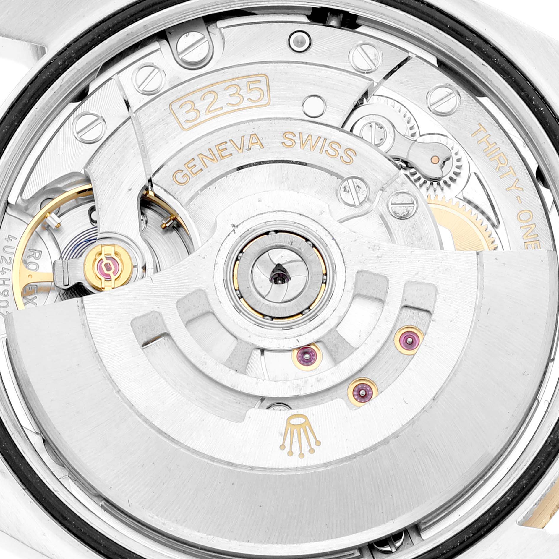 Close-up image of the movement mechanism of a Rolex Datejust 126233 Men's Steel and Gold (two tone) White Dial 126233 Men's Steel and Gold (two tone) White Dial 3235 model.