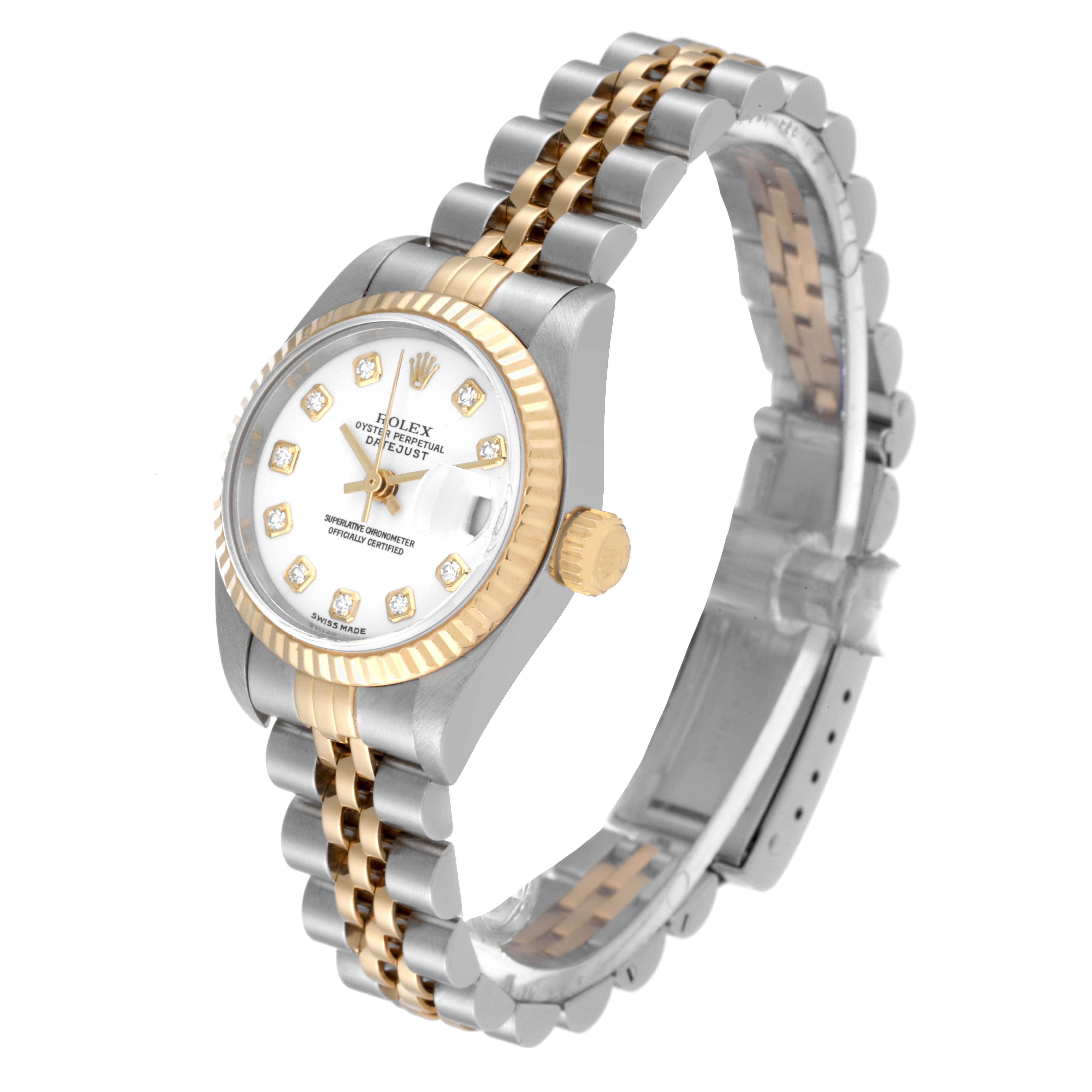 The image shows a Rolex Datejust 79173G Women's Steel and Gold (two tone) White Dial 79173G Women's Steel and Gold (two tone) White Dial watch at a slight angle, displaying its dial, fluted bezel, crown, and two-tone bracelet.