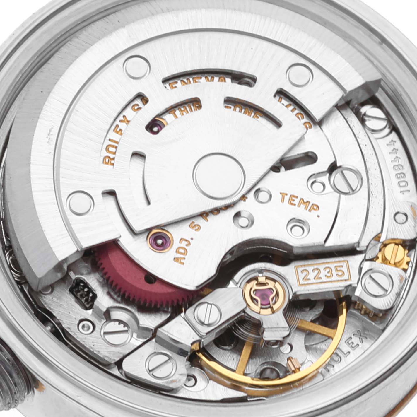 This image shows a close-up of the movement mechanism of a Rolex Datejust 79173G Women's Steel and Gold (two tone) White Dial 79173G Women's Steel and Gold (two tone) White Dial watch.