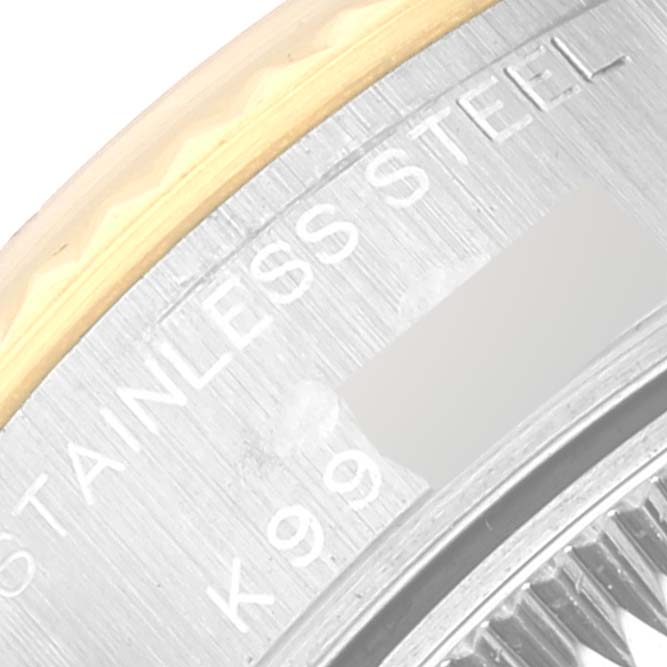This close-up image shows the engraved stainless steel back of a Rolex Datejust 79173G Women's Steel and Gold (two tone) White Dial 79173G Women's Steel and Gold (two tone) White Dial watch.