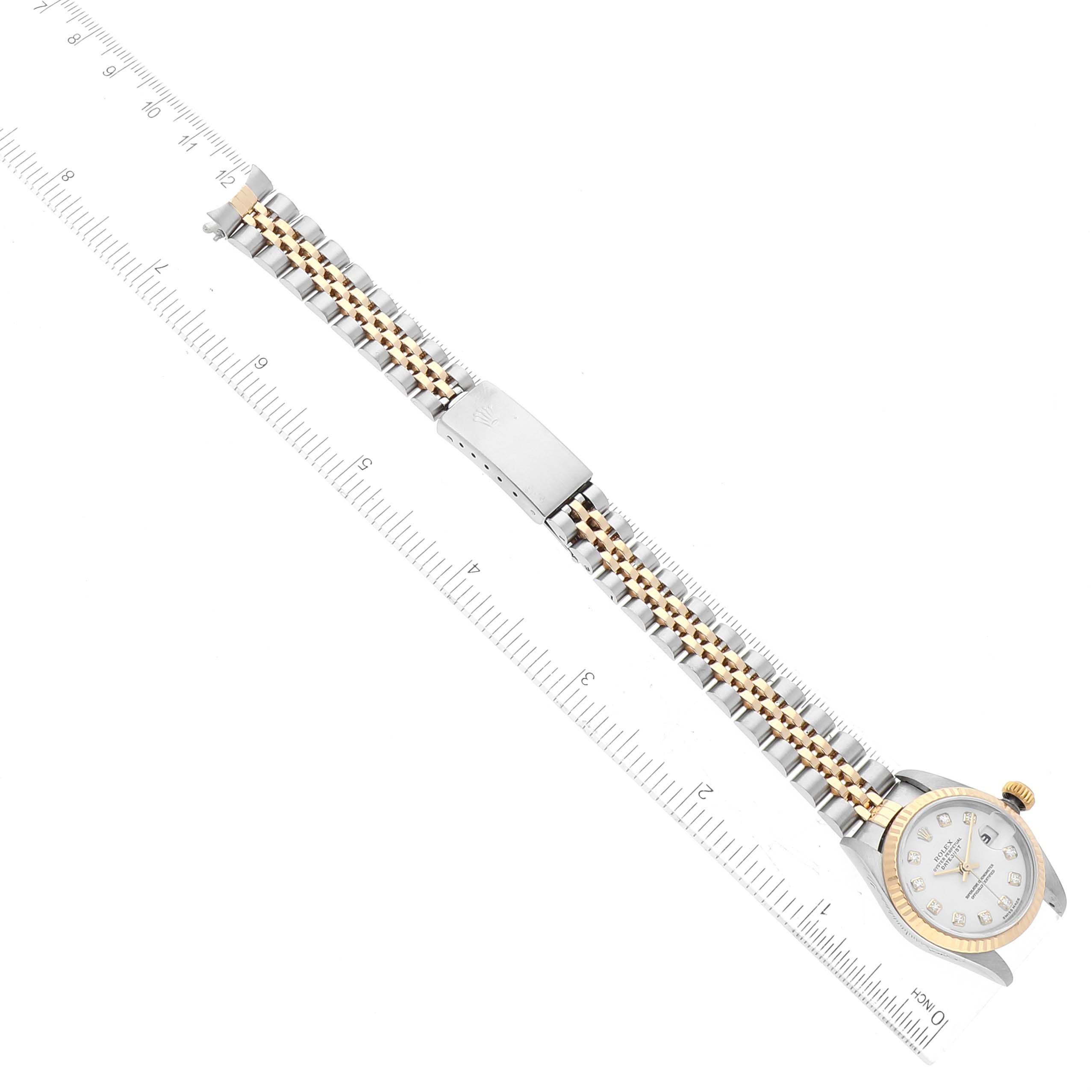 The Rolex Datejust 79173G Women's Steel and Gold (two tone) White Dial 79173G Women's Steel and Gold (two tone) White Dial watch is shown from a top-down angle with its face, bezel, and two-tone bracelet visible.