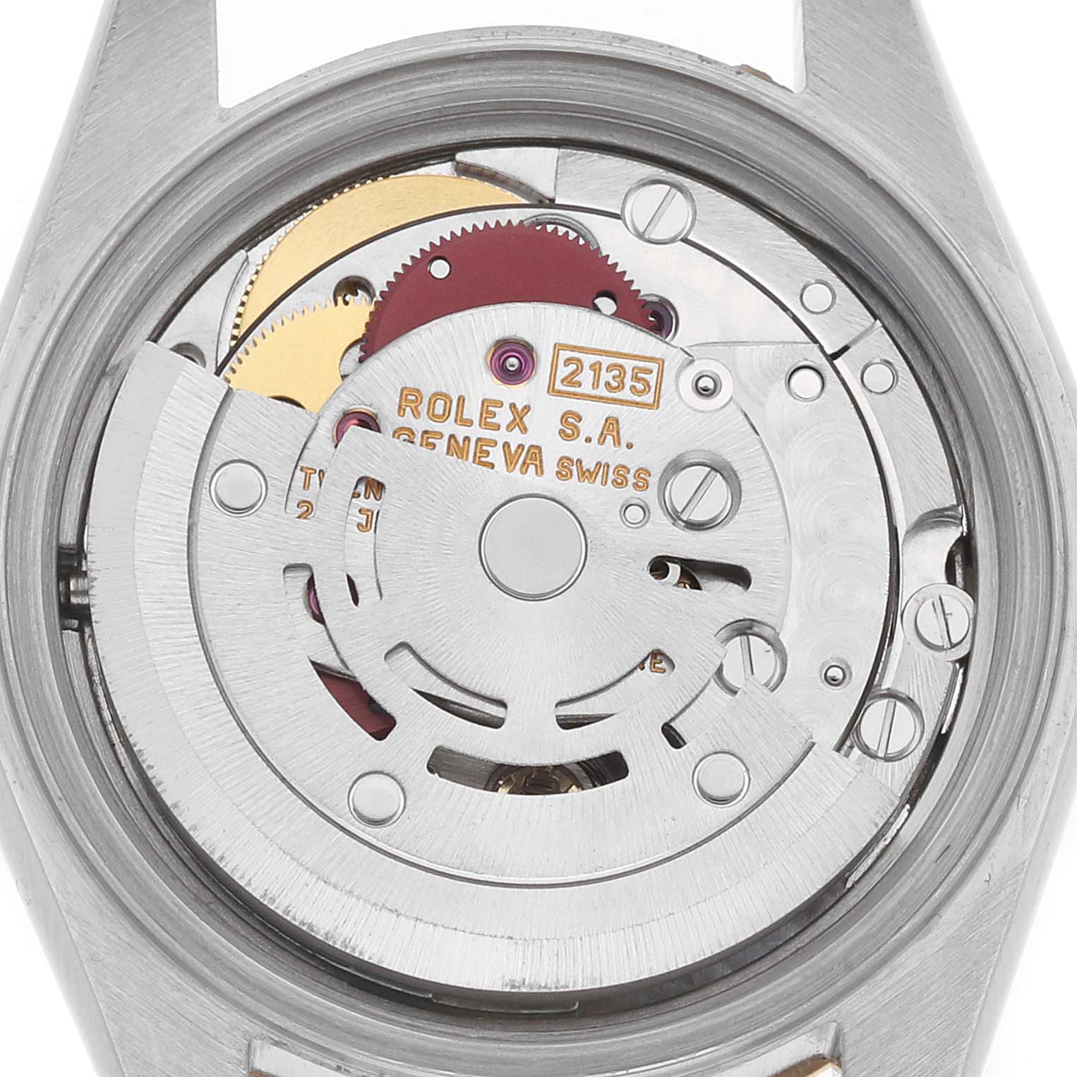 The image shows the movement of a Rolex Datejust 69173 Women's Steel and Gold (two tone) White Dial, focusing on its intricate mechanical components from the back.