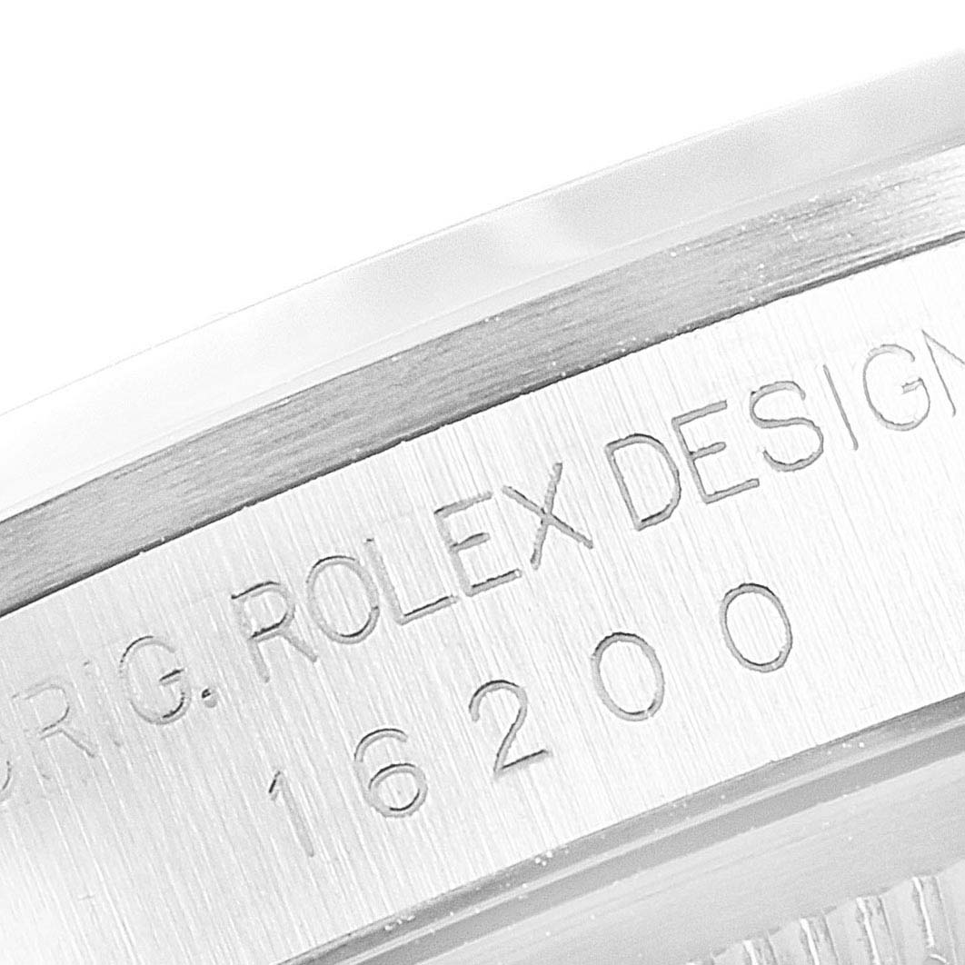 The image shows a close-up of the side of a Rolex Datejust 16200 Men's Stainless Steel White Dial 16200 Men's Stainless Steel White Dial case, displaying the engraved model number 16200.