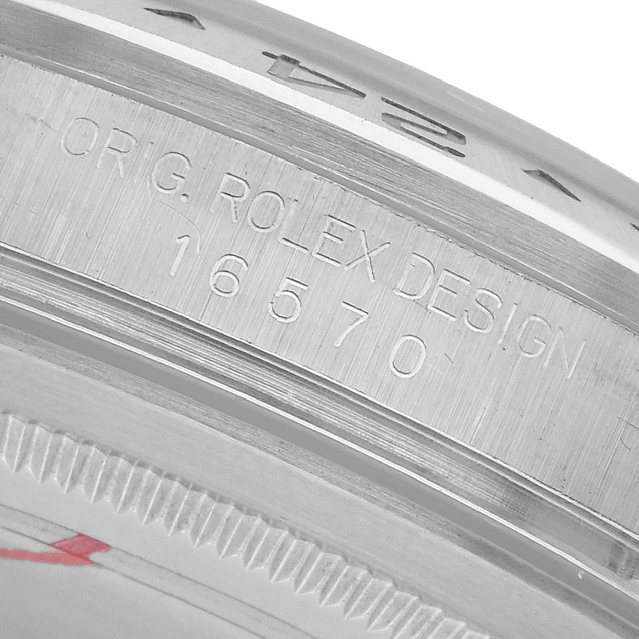 The image shows a close-up of the side of the Rolex Explorer 16570 Men's Stainless Steel White Dial watch, displaying the design number "16570" engraved on its case.