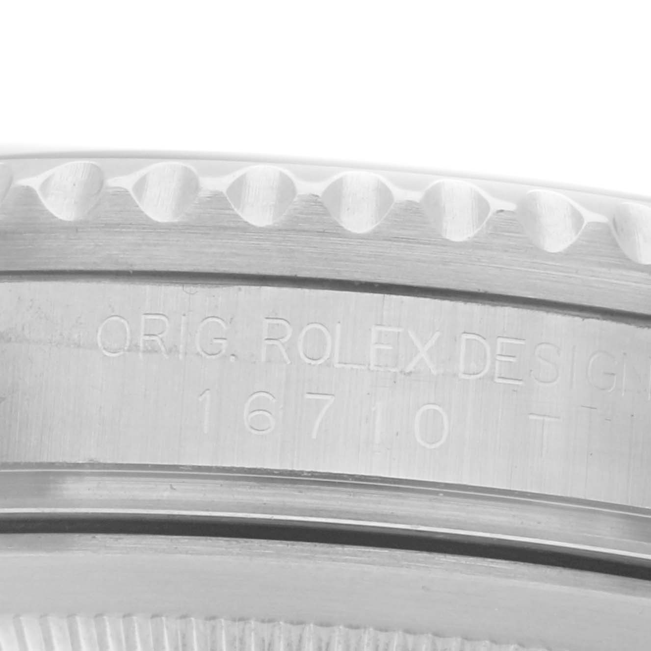 The image shows a close-up of the side of a Rolex GMT-Master 16710 Men's Stainless Steel Black Dial, highlighting its bezel and engraved model number.