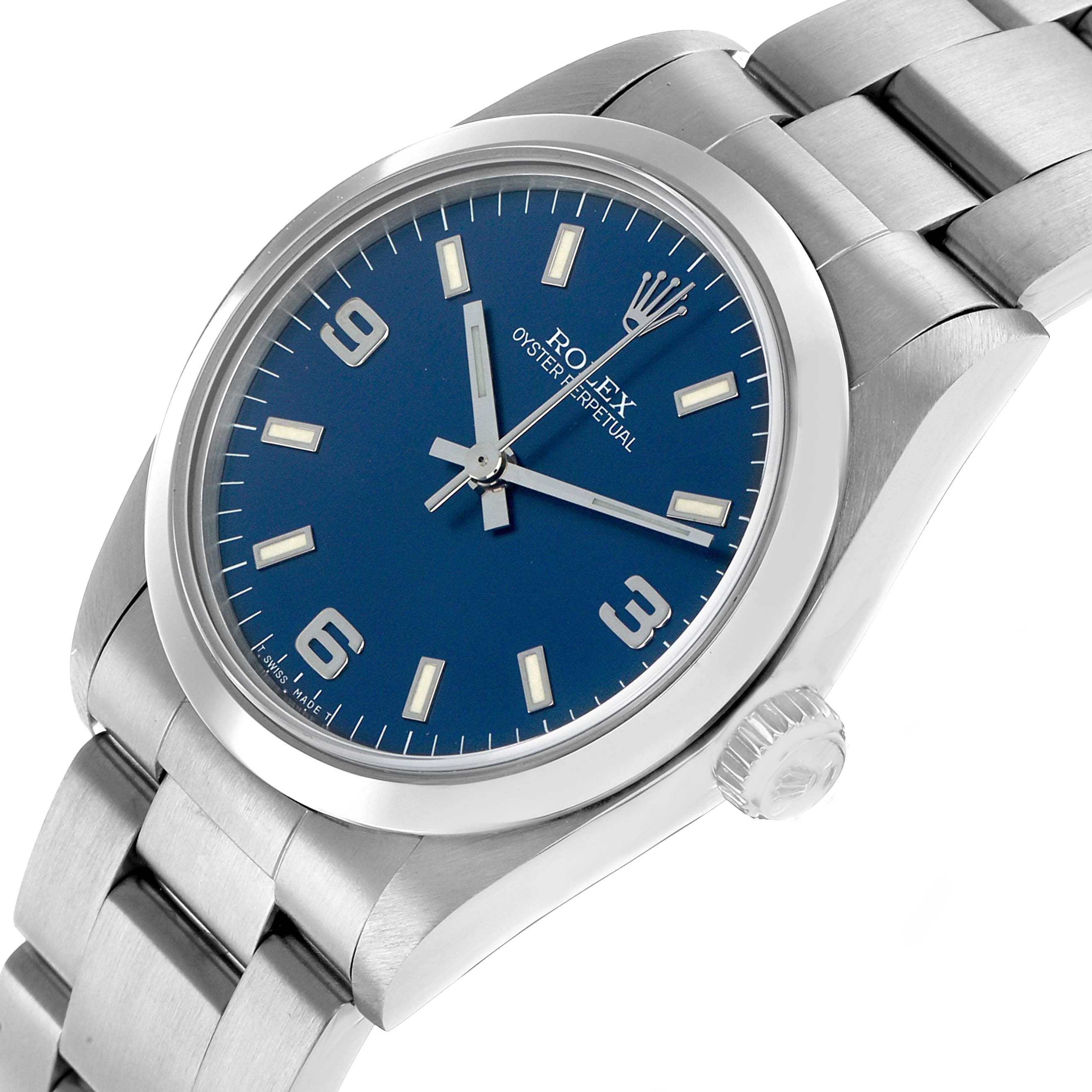 The Rolex Mid-Size 67480 Women's Stainless Steel Blue Dial watch is shown at a tilted angle highlighting the dial, bezel, crown, and bracelet links.
