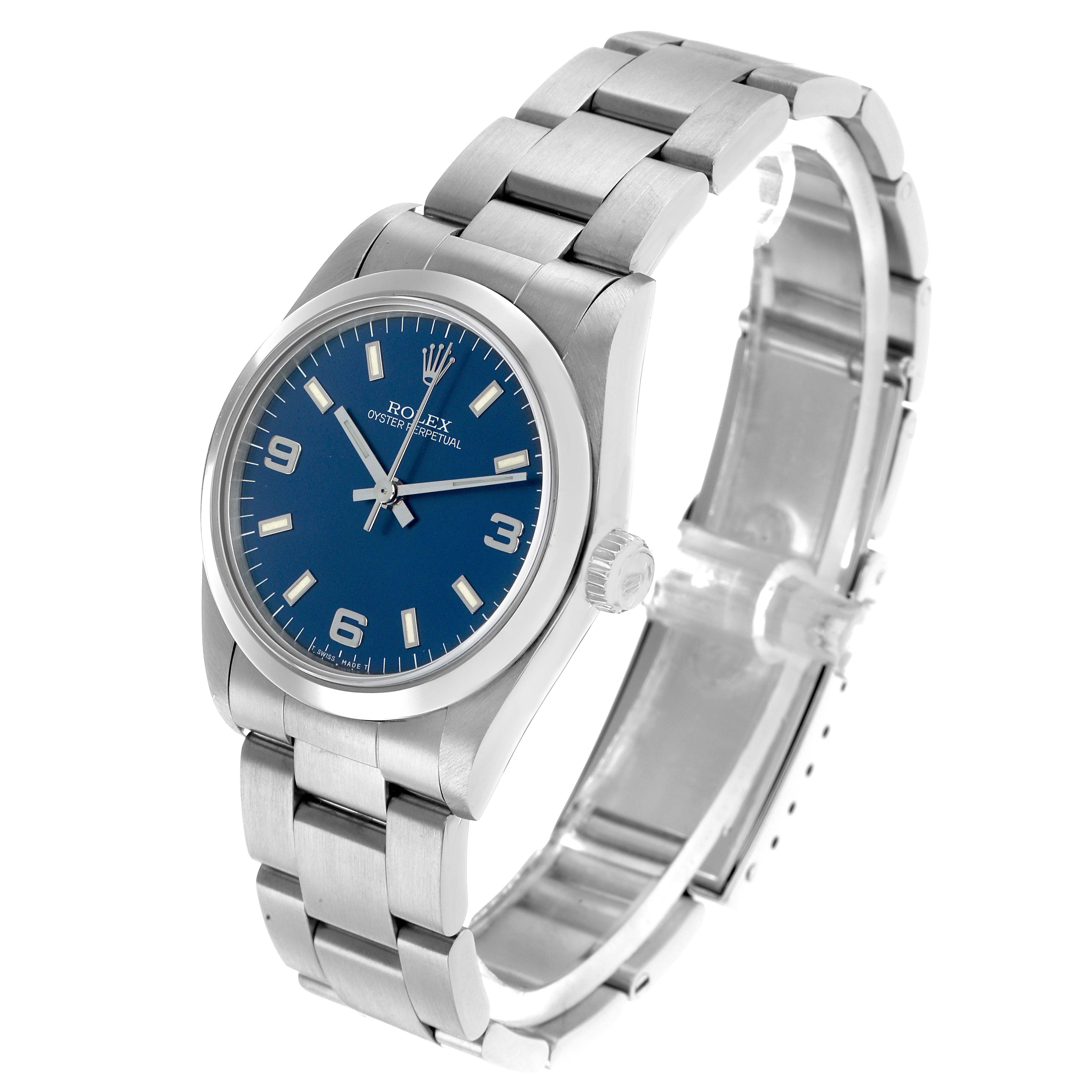 The Rolex Mid-Size 67480 Women's Stainless Steel Blue Dial watch is shown at a three-quarter angle, displaying the blue dial, crown, and stainless steel bracelet.
