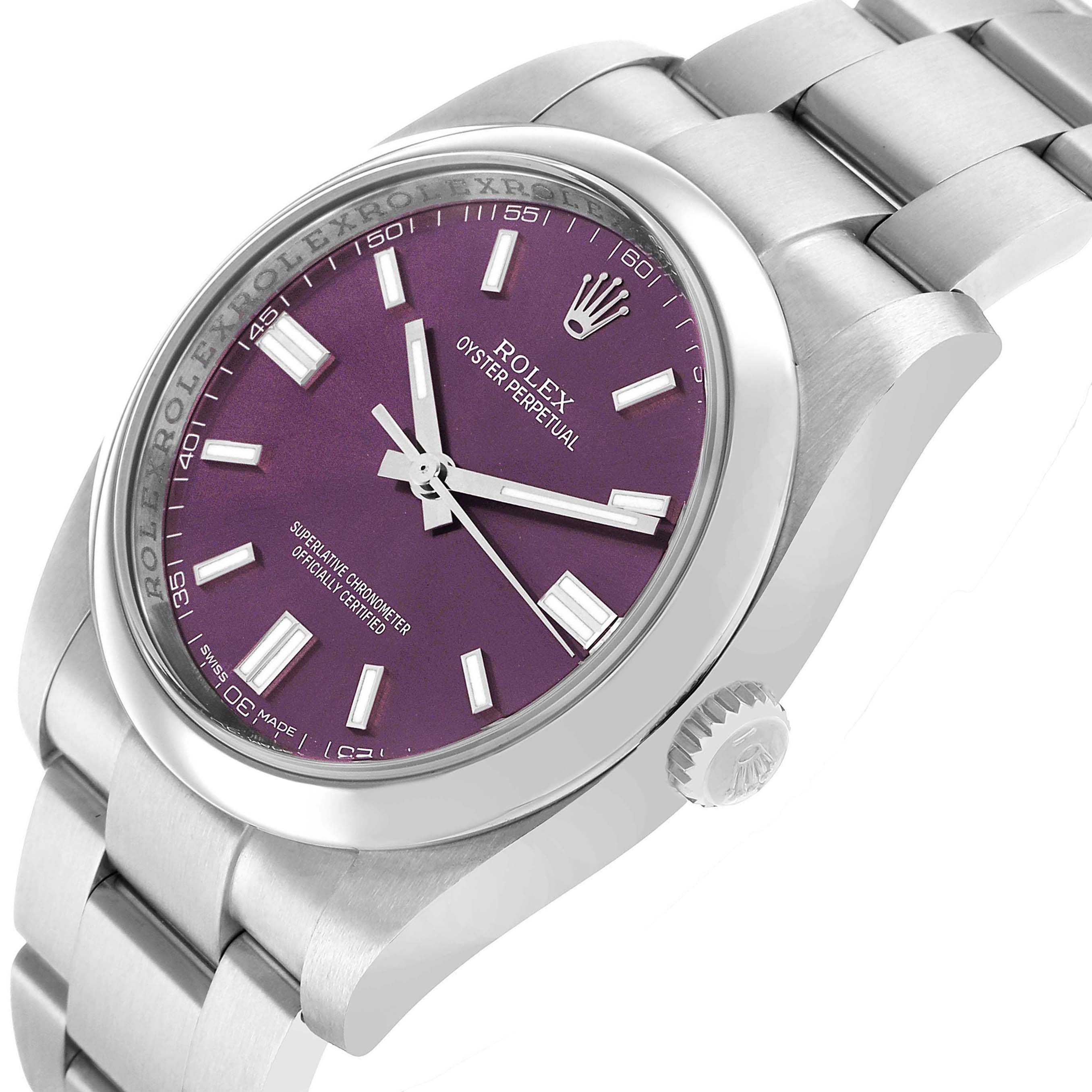 The Rolex Oyster Perpetual 116000 Men's Stainless Steel Purple Dial watch is shown at an angle highlighting the purple dial, bezel, crown, and part of the bracelet.