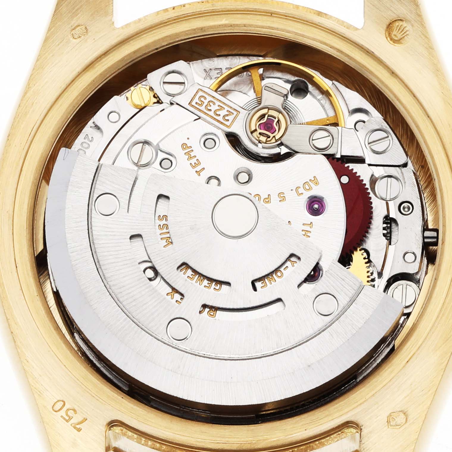 The image shows the movement of a Rolex President 179178 Women's Yellow Gold Champagne Dial model from the back, highlighting the rotor and gears.