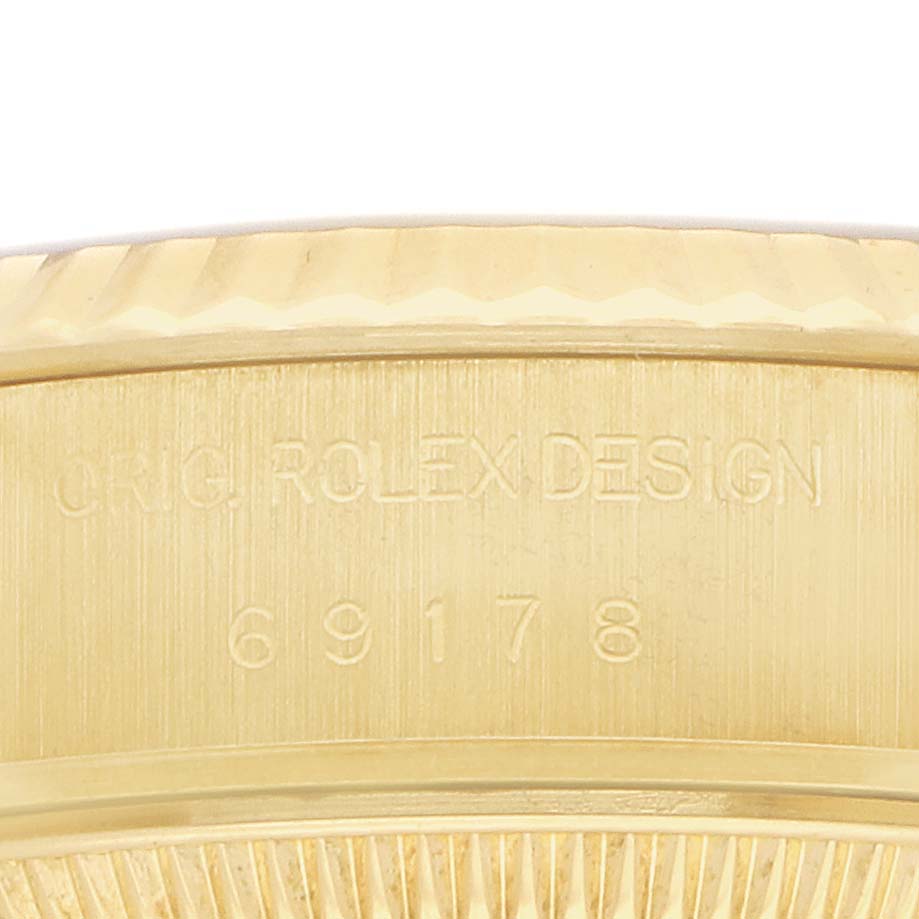 The image shows a close-up of the case side, displaying engravings for the Rolex President 69178 Women's Yellow Gold White Dial model.