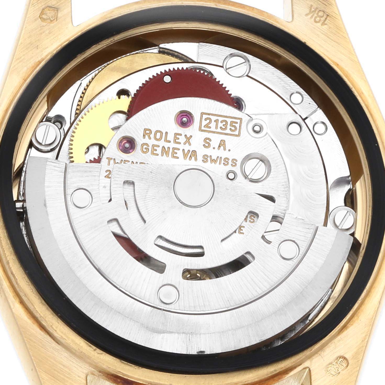 The image shows the movement of a Rolex President 69178 Women's Yellow Gold White Dial model from the back, highlighting the internal gears and rotor.