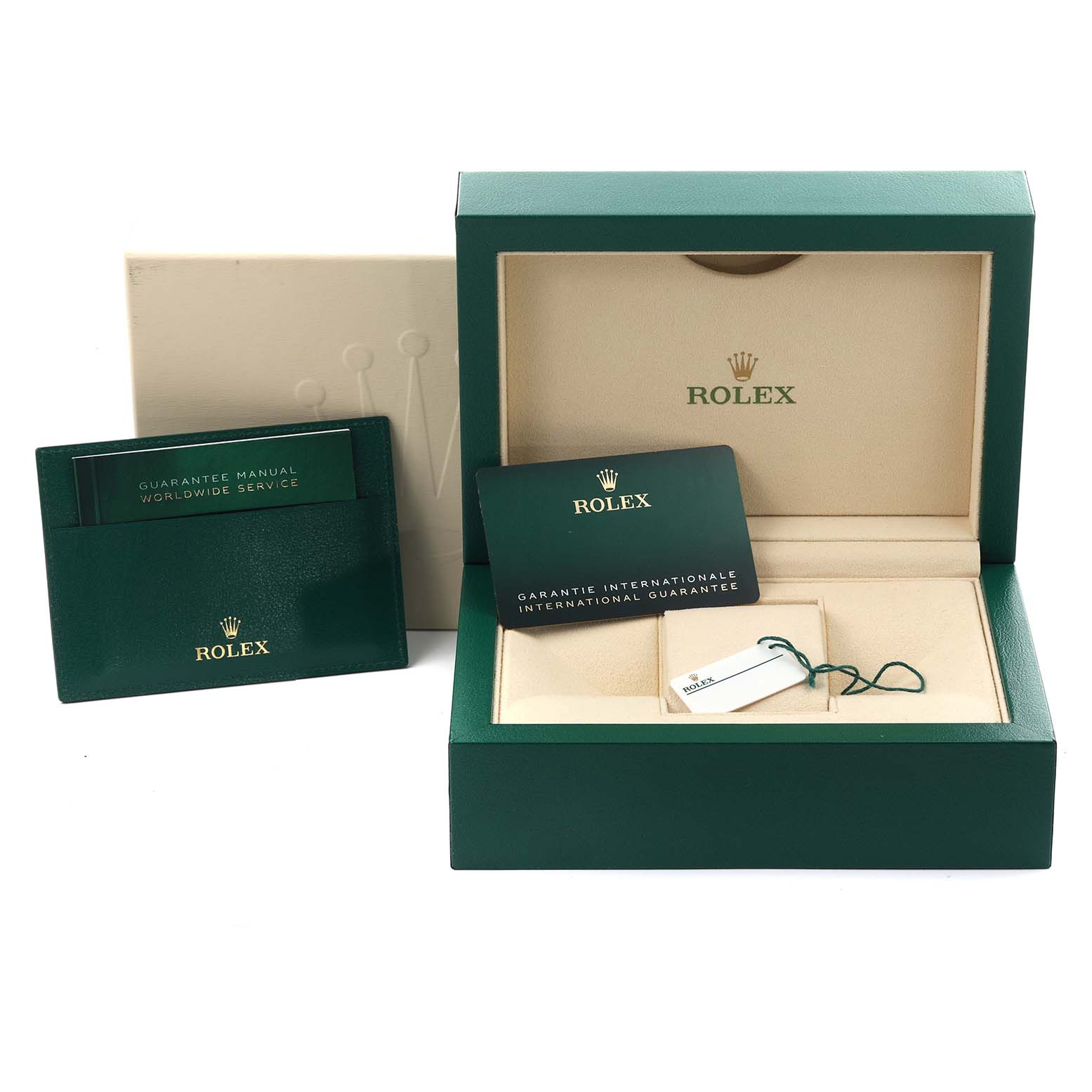 The image shows the packaging and accessories for a Rolex President 228235-004 Men's Rose Gold Silver Dial 228235-004 Men's Rose Gold Silver Dial model, including the box, warranty card, and manual.