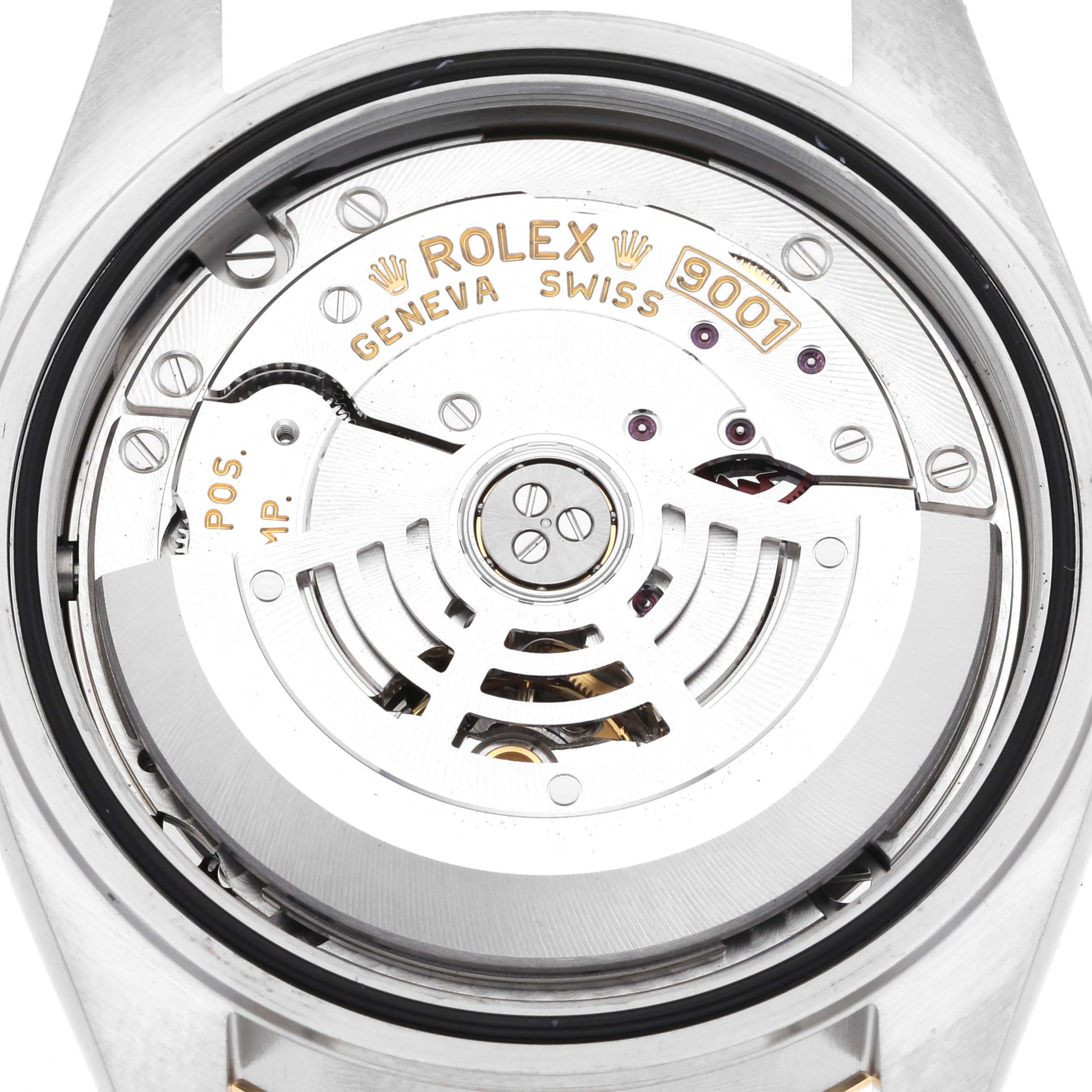 The image shows the movement and rotor mechanism of a Rolex Sky-Dweller 326933 Men
s Steel and Gold (two tone) Black Dial 326933 Men
s Steel and Gold (two tone) Black Dial, viewed from the back of the watch case.