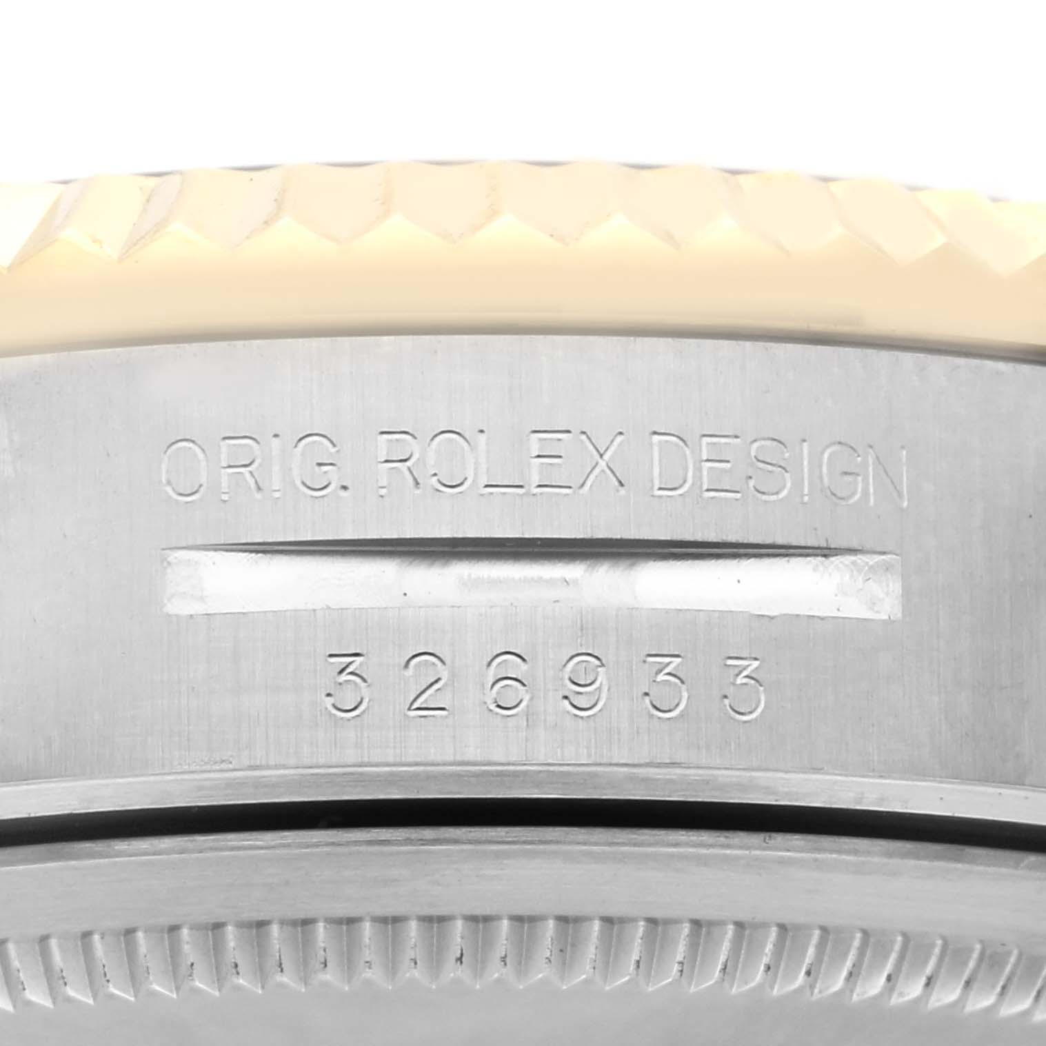 The image shows a close-up of the side of a Rolex Sky-Dweller 326933 Men
s Steel and Gold (two tone) Black Dial 326933 Men
s Steel and Gold (two tone) Black Dial, highlighting the engraved model number.