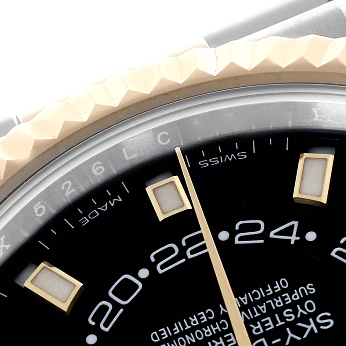 The Rolex Sky-Dweller 326933 Men
s Steel and Gold (two tone) Black Dial 326933 Men
s Steel and Gold (two tone) Black Dial watch is shown at an angle highlighting the dial, bezel, and part of the case.