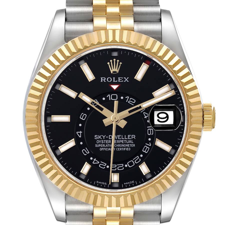 The Rolex Sky-Dweller watch is shown from the front, highlighting its black dial, gold fluted bezel, and two-tone bracelet.