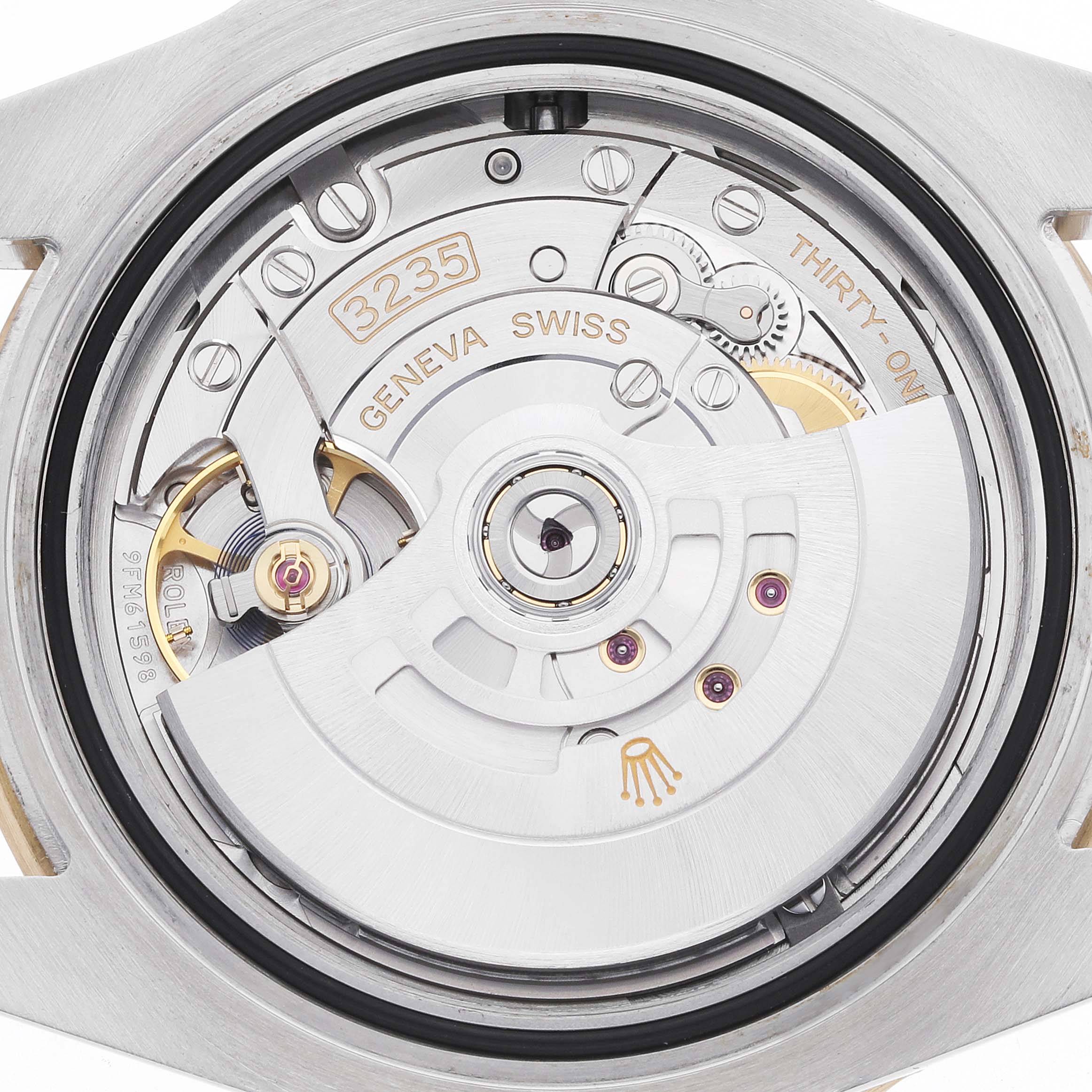 The image shows the back view of a Rolex Submariner 126613 Men's Steel and Gold (two tone) Blue Dial, revealing its movement and mechanical components.