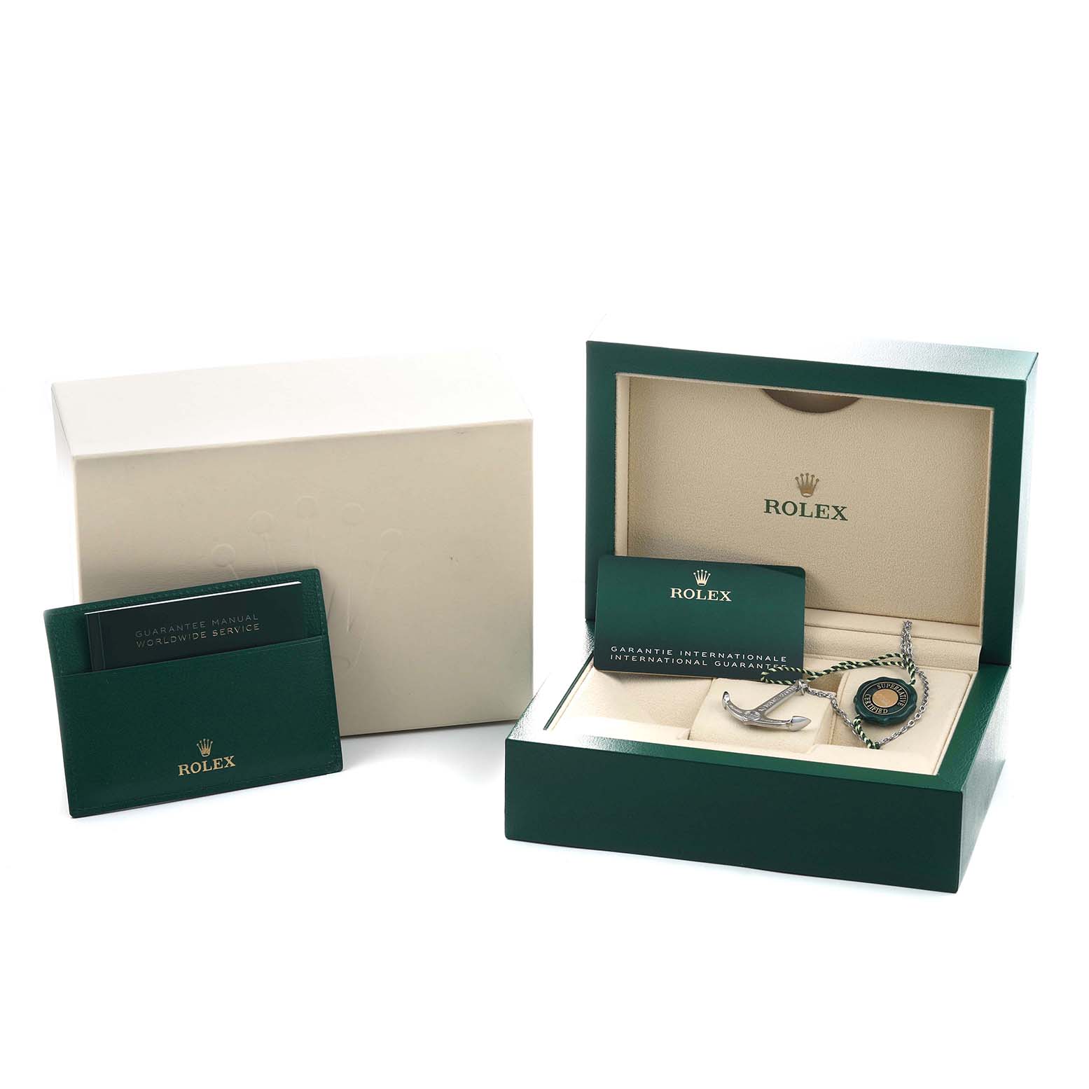 The image shows a Rolex Submariner 126613 Men's Steel and Gold (two tone) Blue Dial box set with warranty cards and a tag, viewed from above.