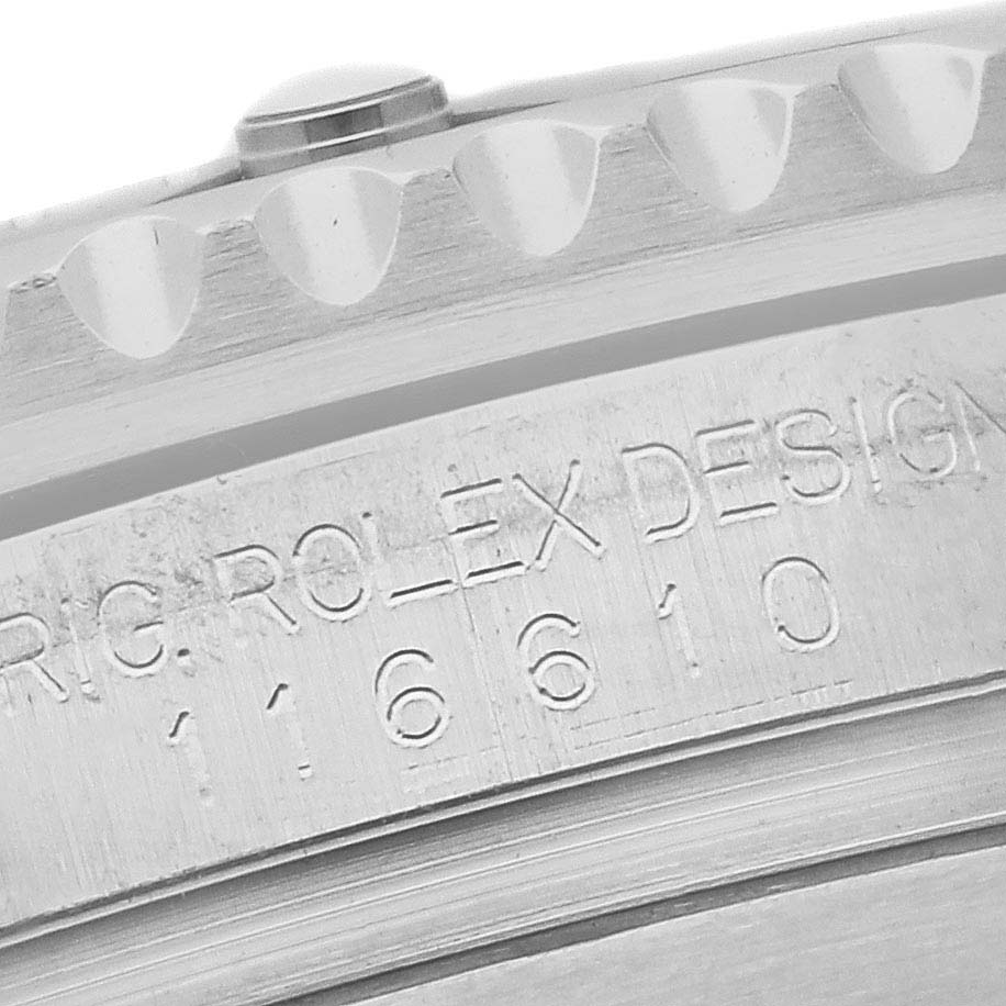 The image shows a close-up of the serial engraving on the case of a Rolex Submariner 116610 Men
s Stainless Steel Black Dial 116610 Men
s Stainless Steel Black Dial.