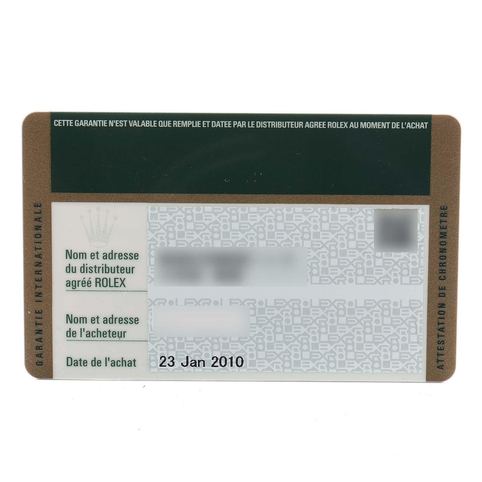 This image shows the warranty card for the Rolex Submariner 16610 Men's Stainless Steel Black Dial, highlighting the purchase date and blank sections for distributor and buyer information.