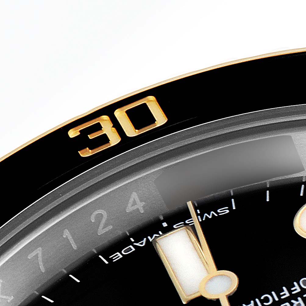The image shows a close-up of the bezel and part of the dial of a Rolex Submariner 116613 Men's Steel and Gold (two tone) Black Dial 116613 Men's Steel and Gold (two tone) Black Dial watch, with the "30" marker visible.