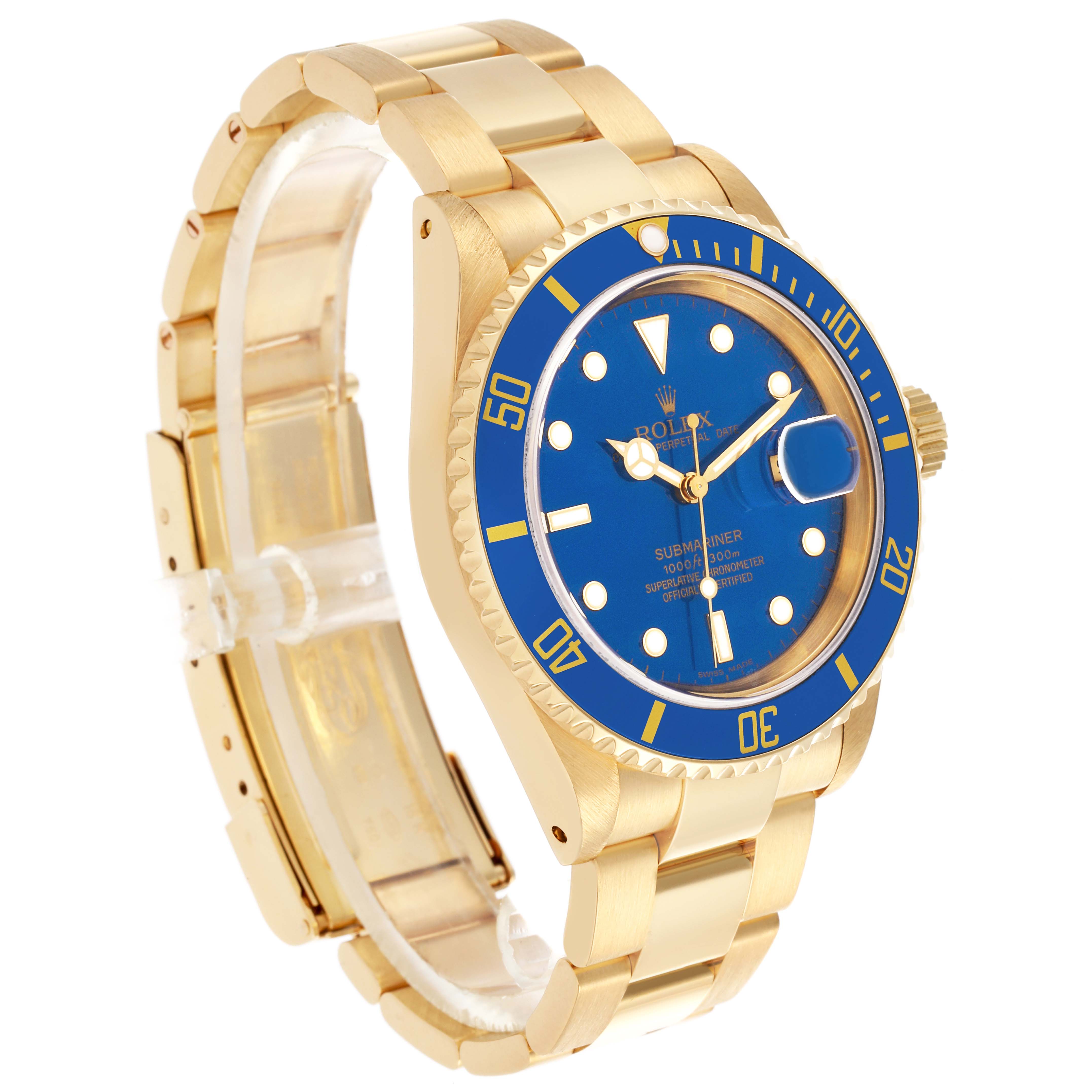 The Rolex Submariner 16618 Men's Yellow Gold Blue Dial 16618 Men's Yellow Gold Blue Dial is shown from a 3/4 angle, highlighting its blue dial and bezel, gold case, and bracelet.