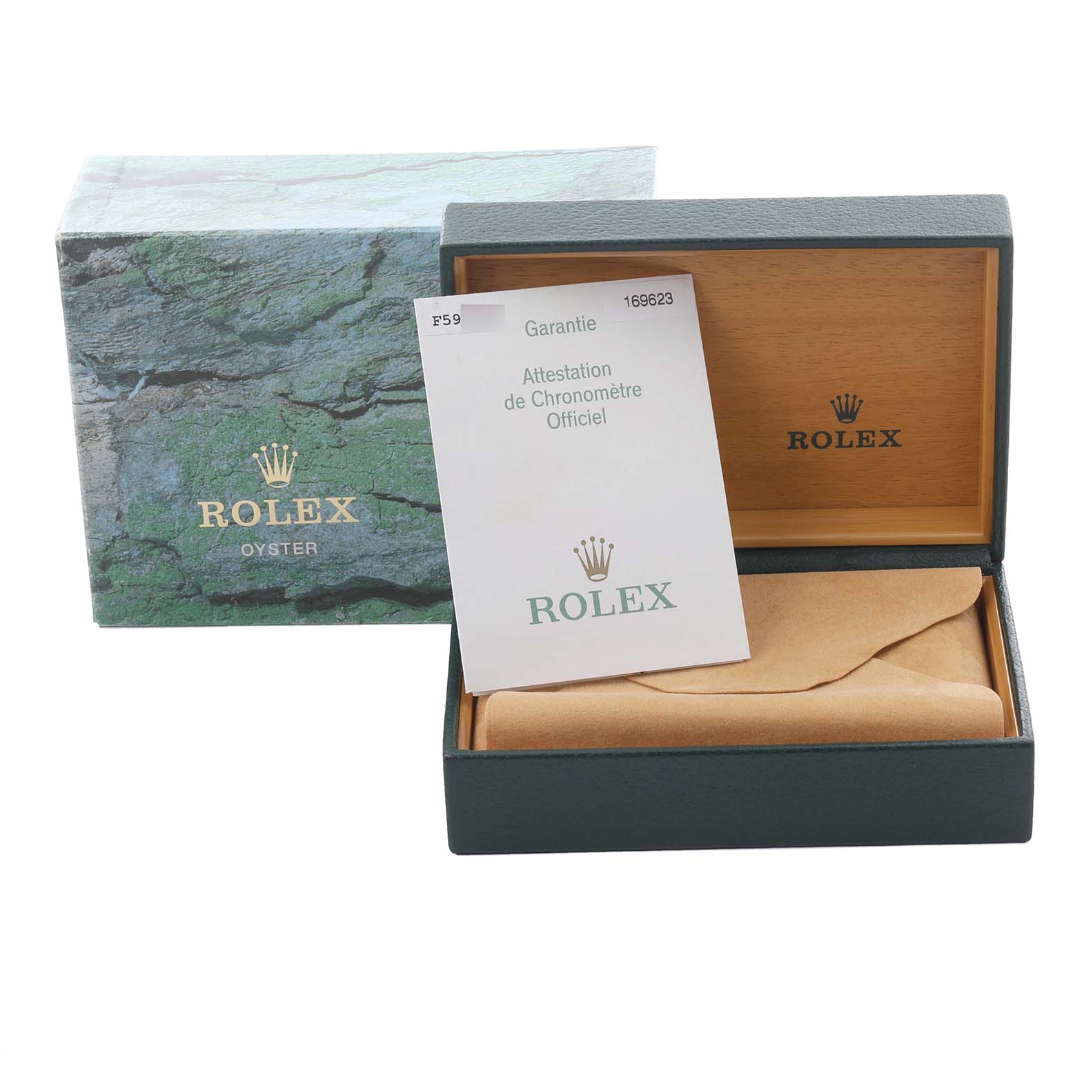 The image shows the packaging and paperwork for a Rolex Yacht-Master 169623 Women's Steel and Gold (two tone) Silver Dial 169623 Women's Steel and Gold (two tone) Silver Dial, including the box and warranty card.
