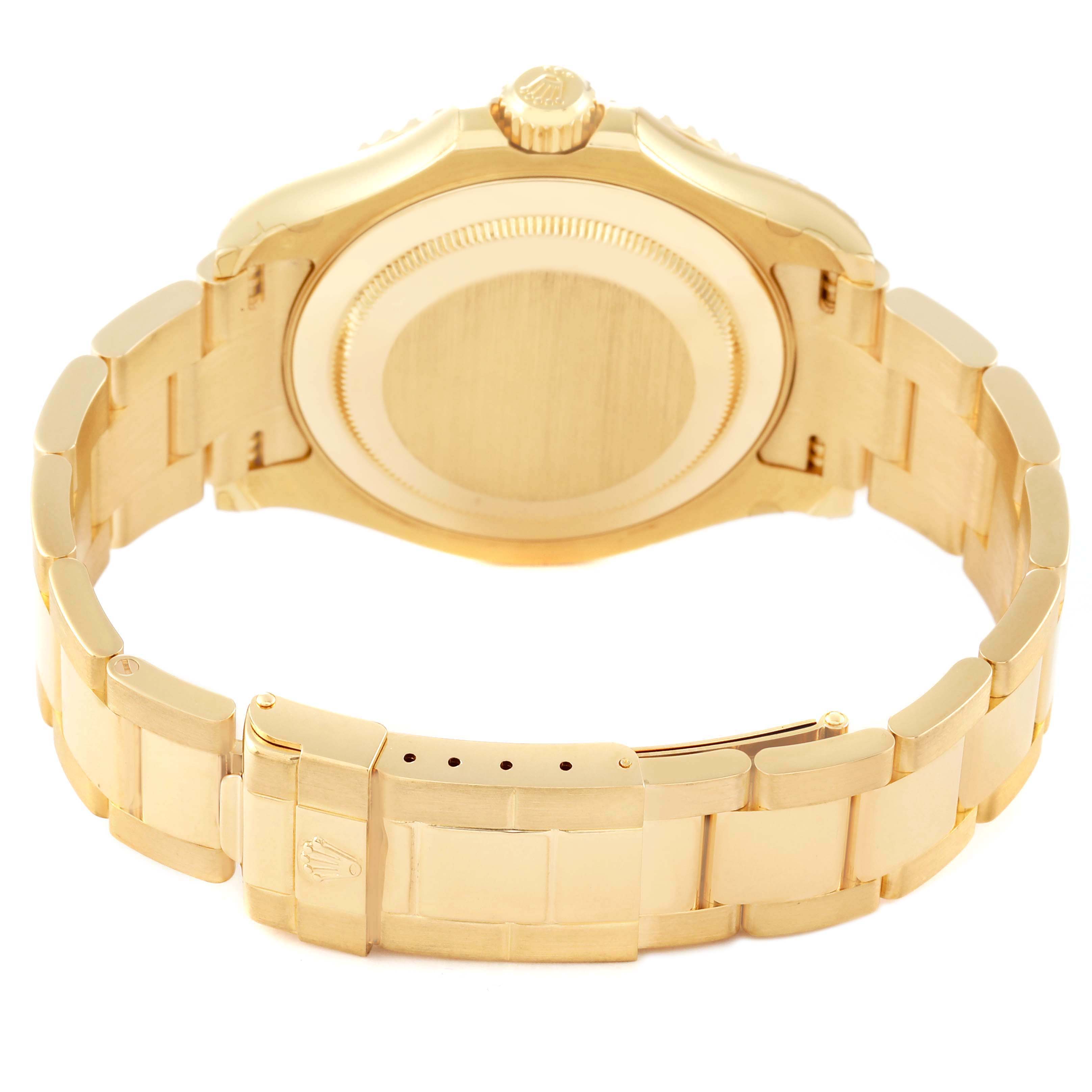 The image shows the backside of a Rolex Yacht-Master 16628 Men's Yellow Gold Blue Dial 16628 Men's Yellow Gold Blue Dial watch, focusing on the case back, bracelet, and clasp.