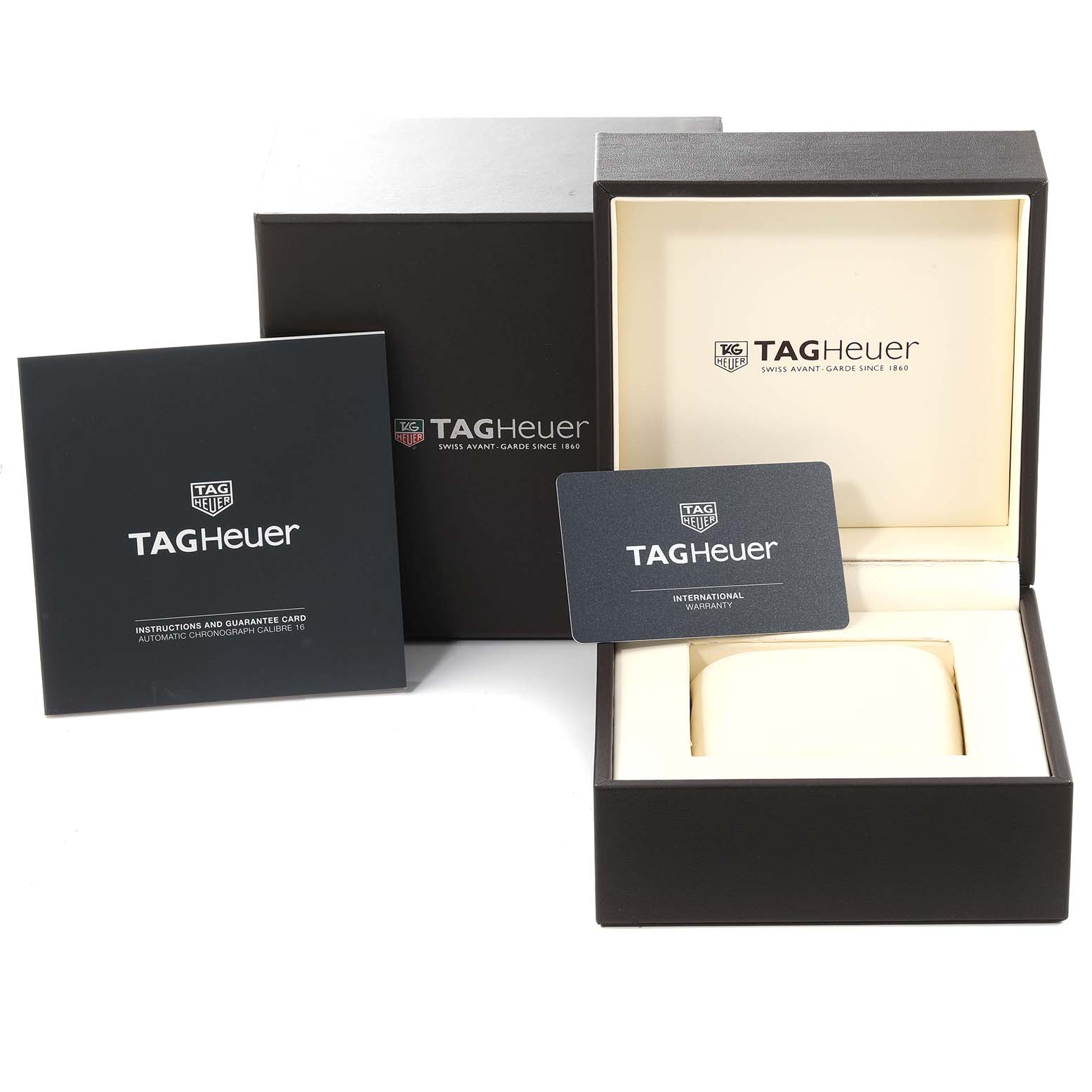 The image shows the Tag Heuer Carrera CBK2112.BA0715 Men's Stainless Steel Blue Dial CBK2112.BA0715 Men's Stainless Steel Blue Dial watch box, an instruction manual, and an international warranty card.