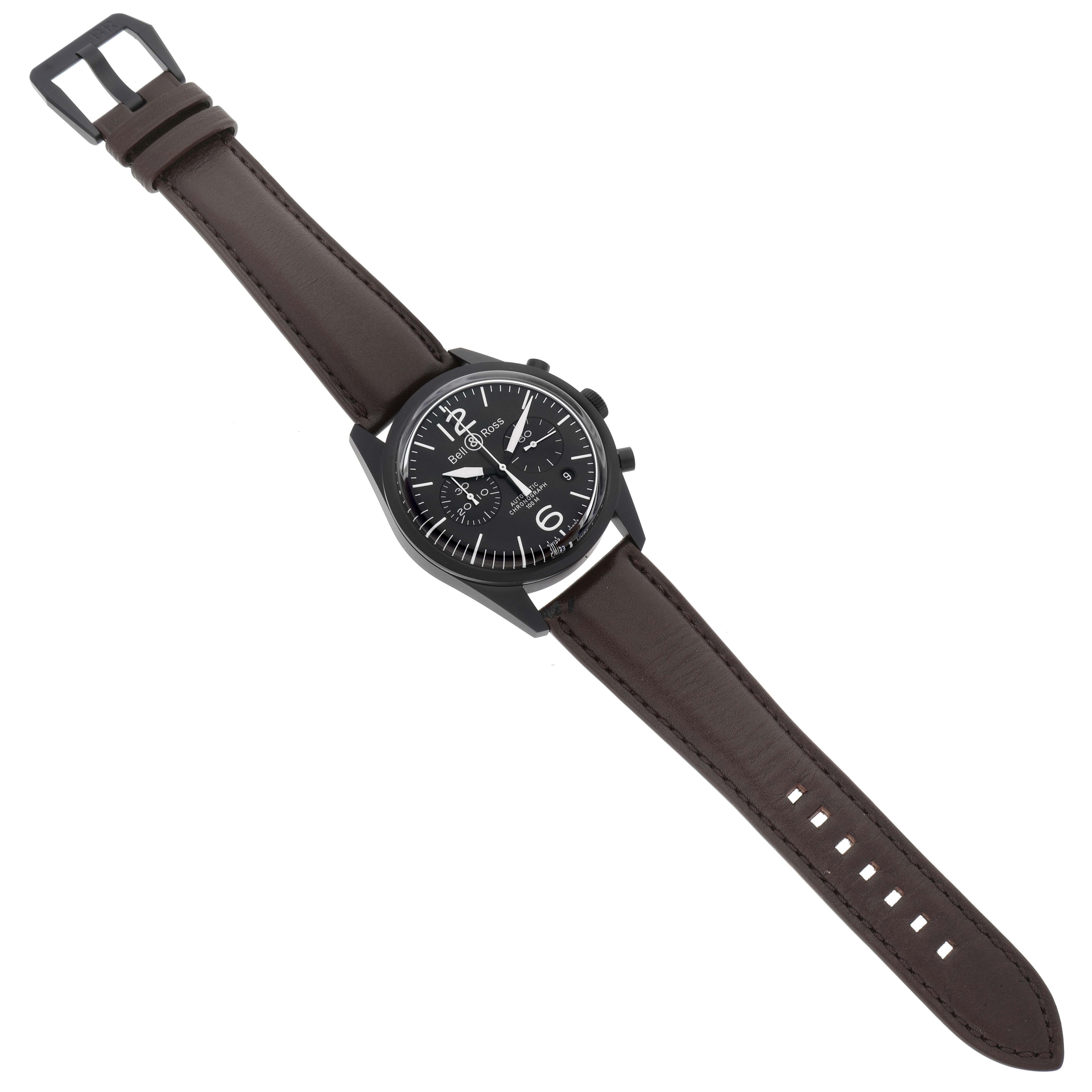 The image shows a top-down view of the Bell & Ross Heritage BRV126-94-SC Men's Stainless Steel Black Dial BRV126-94-SC Men's Stainless Steel Black Dial model watch, featuring a black dial, leather strap, and visible chronograph pushers.