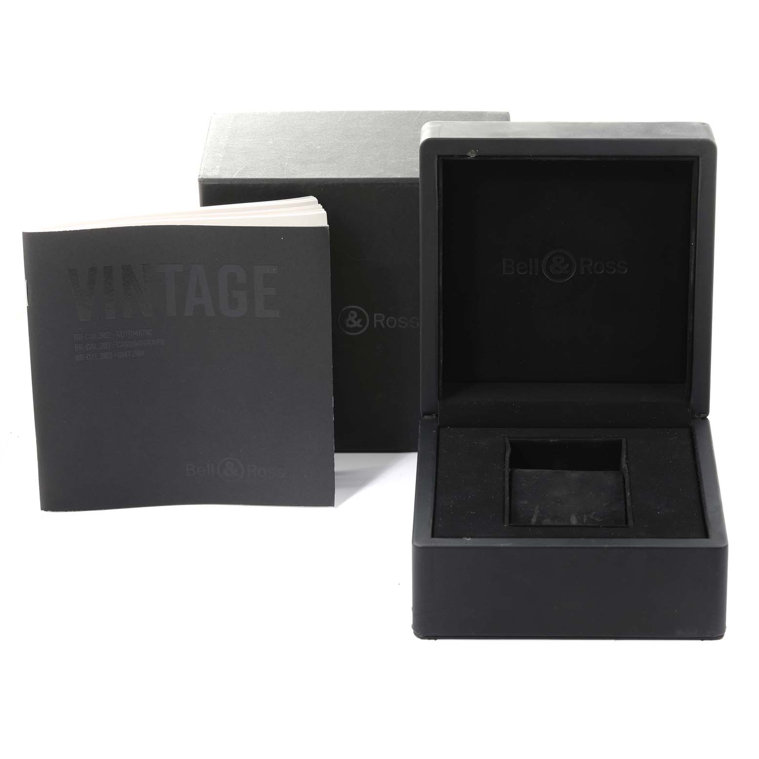 The image shows the open box and manual for the Bell & Ross Heritage BRV126-94-SC Men's Stainless Steel Black Dial BRV126-94-SC Men's Stainless Steel Black Dial model watch.