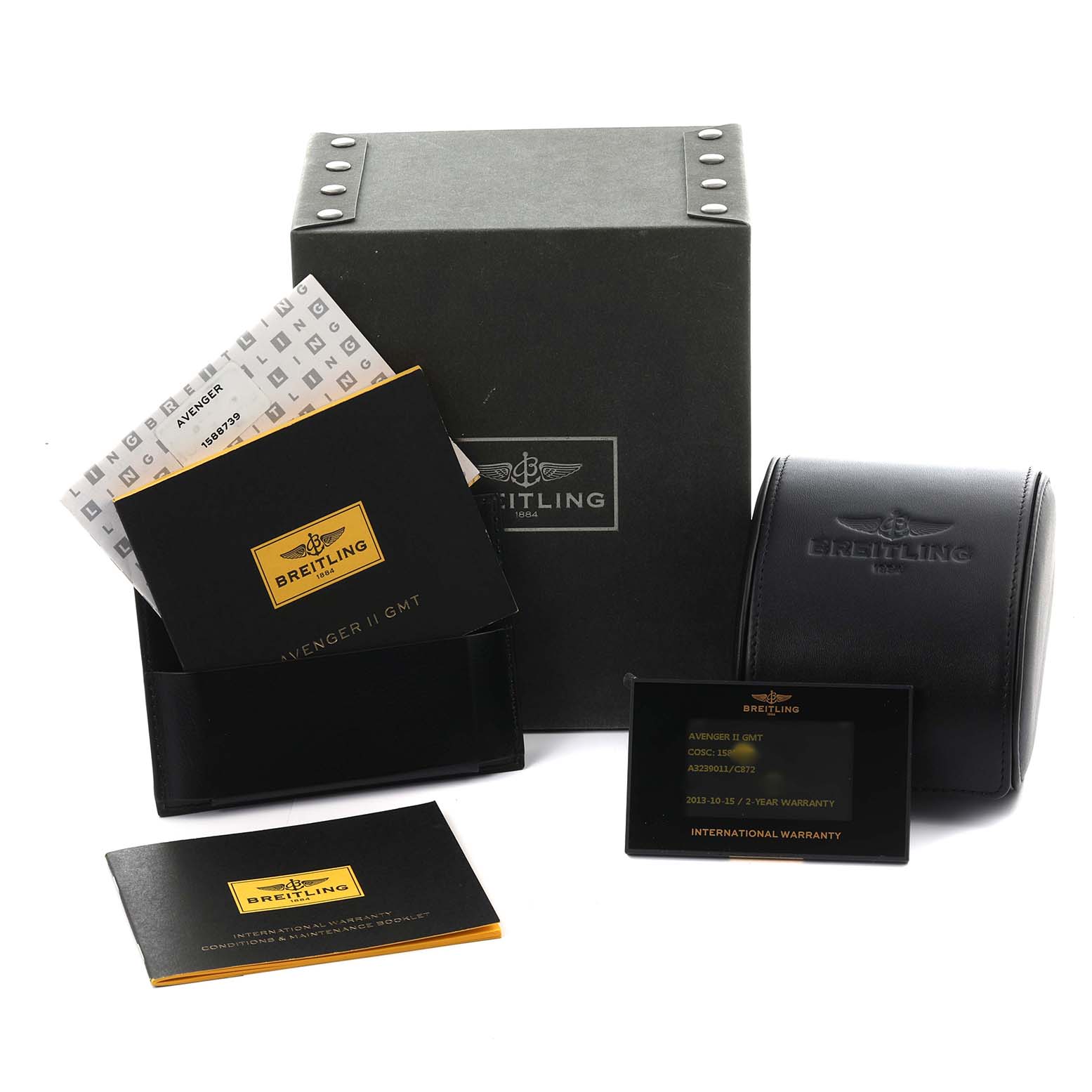 The image shows the packaging and accessories for the Breitling Avenger A3239011/C872 Men's Stainless Steel Blue Dial A3239011/C872 Men's Stainless Steel Blue Dial watch, including boxes, manuals, and a warranty card.