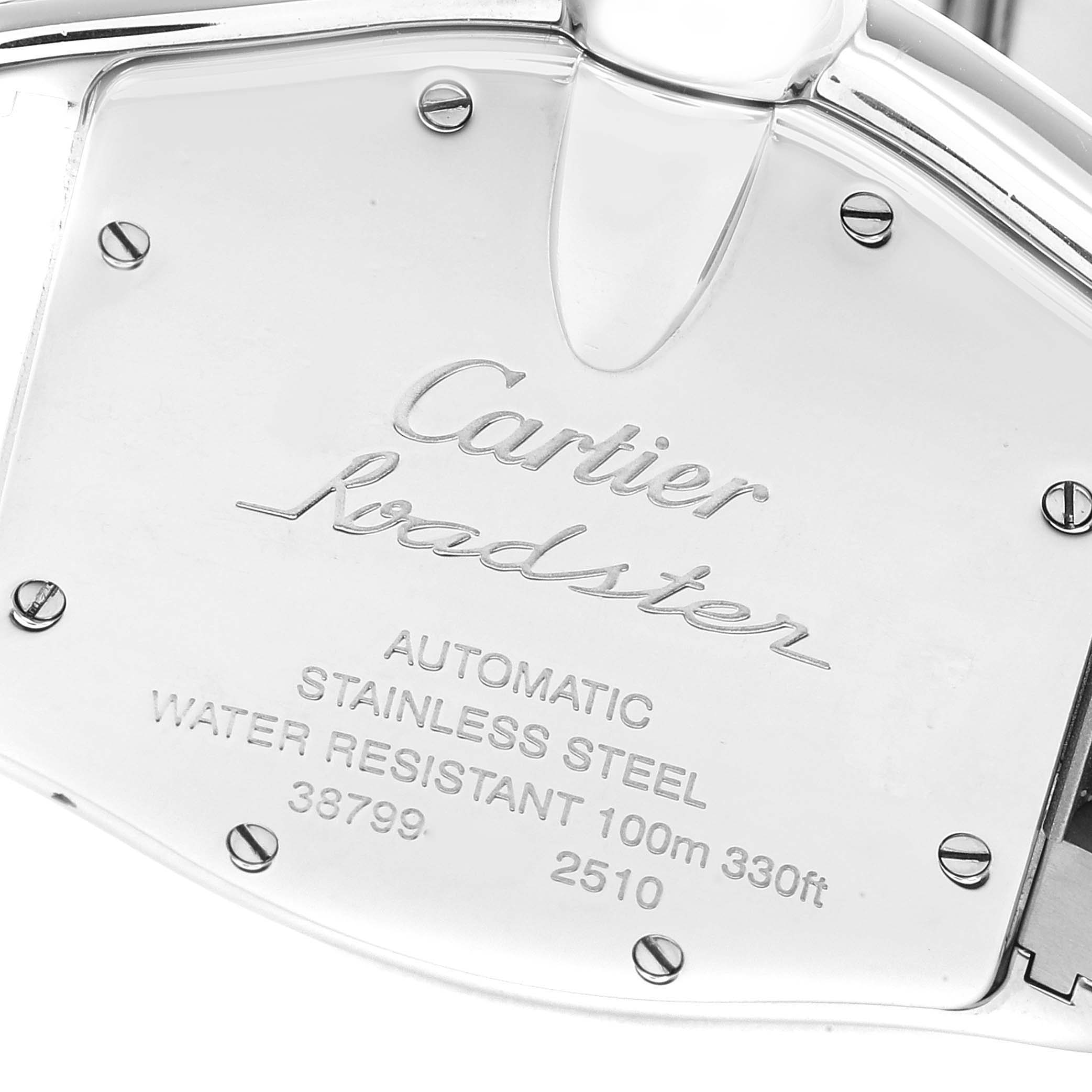 The image shows the back case of the Cartier Roadster W62004V3 Men's Stainless Steel Black Dial W62004V3 Men's Stainless Steel Black Dial watch, highlighting its engravings and screws.