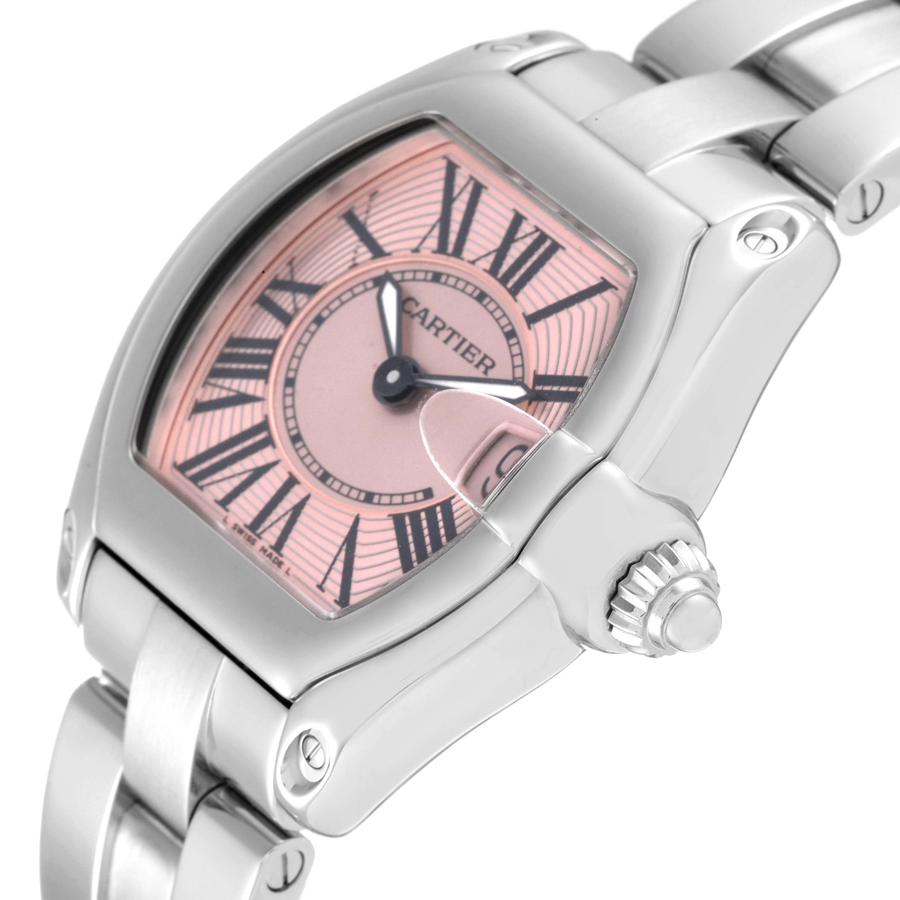 The image shows a close-up angle of the Cartier Roadster W62017V3 Women's Stainless Steel Pink Dial W62017V3 Women's Stainless Steel Pink Dial watch, highlighting the dial, crown, and part of the bracelet.
