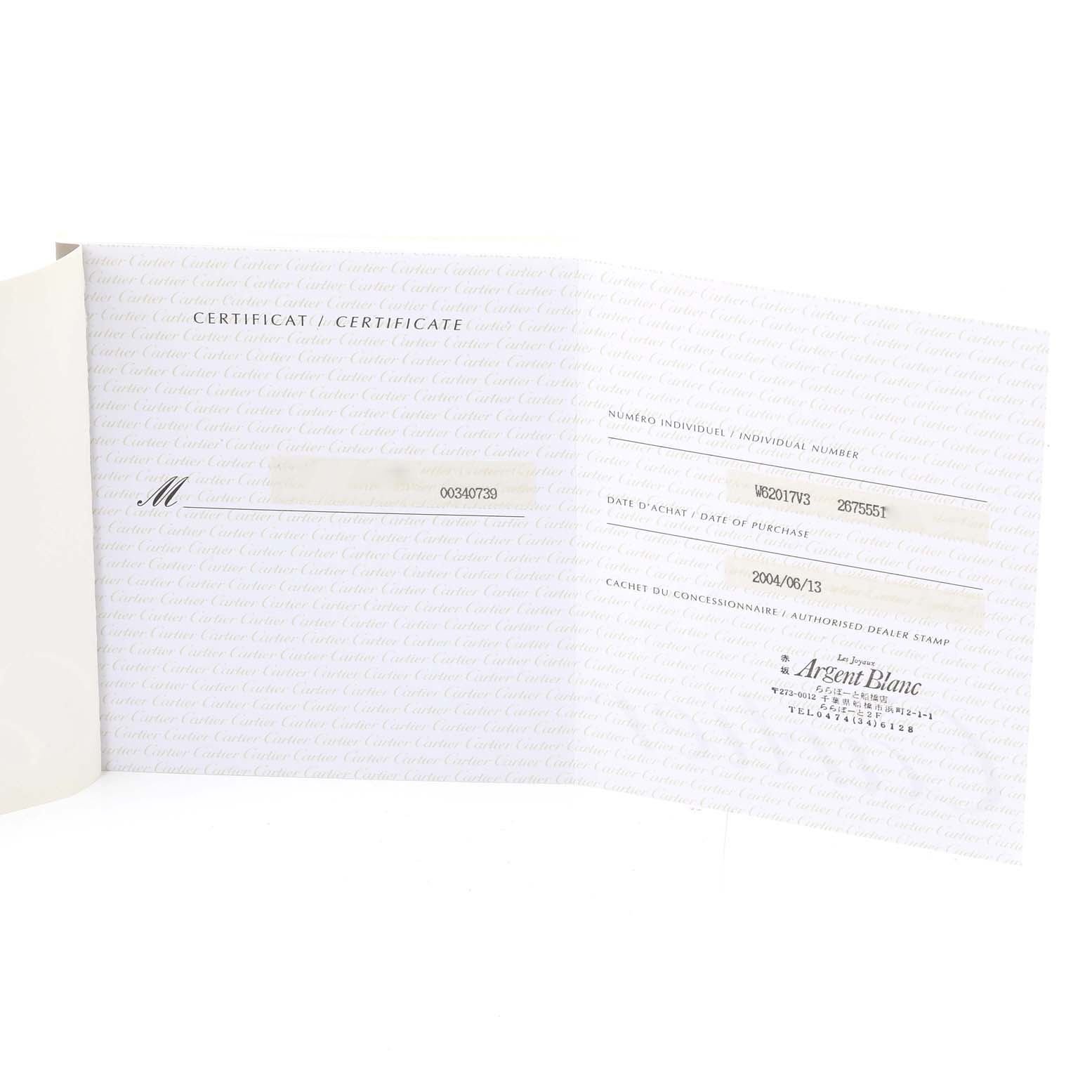 This image shows the warranty certificate for a Cartier Roadster W62017V3 Women's Stainless Steel Pink Dial W62017V3 Women's Stainless Steel Pink Dial watch, displaying the individual number, date of purchase, and dealer stamp.