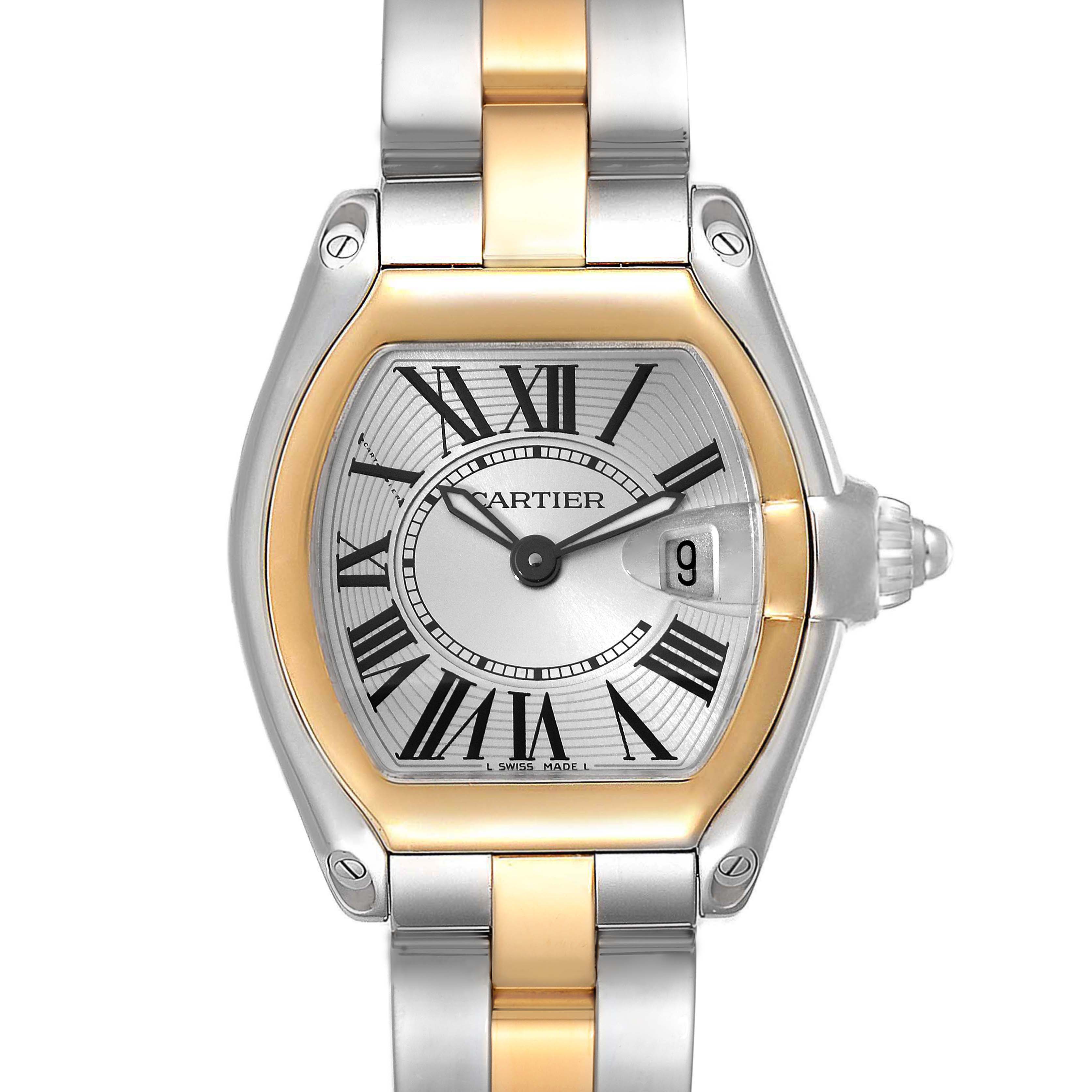 The Cartier Roadster W62026Y4 Women's Steel and Gold (two tone) Silver Dial W62026Y4 Women's Steel and Gold (two tone) Silver Dial watch is shown from a front angle, highlighting its dial, Roman numerals, date, and two-tone metal bracelet.