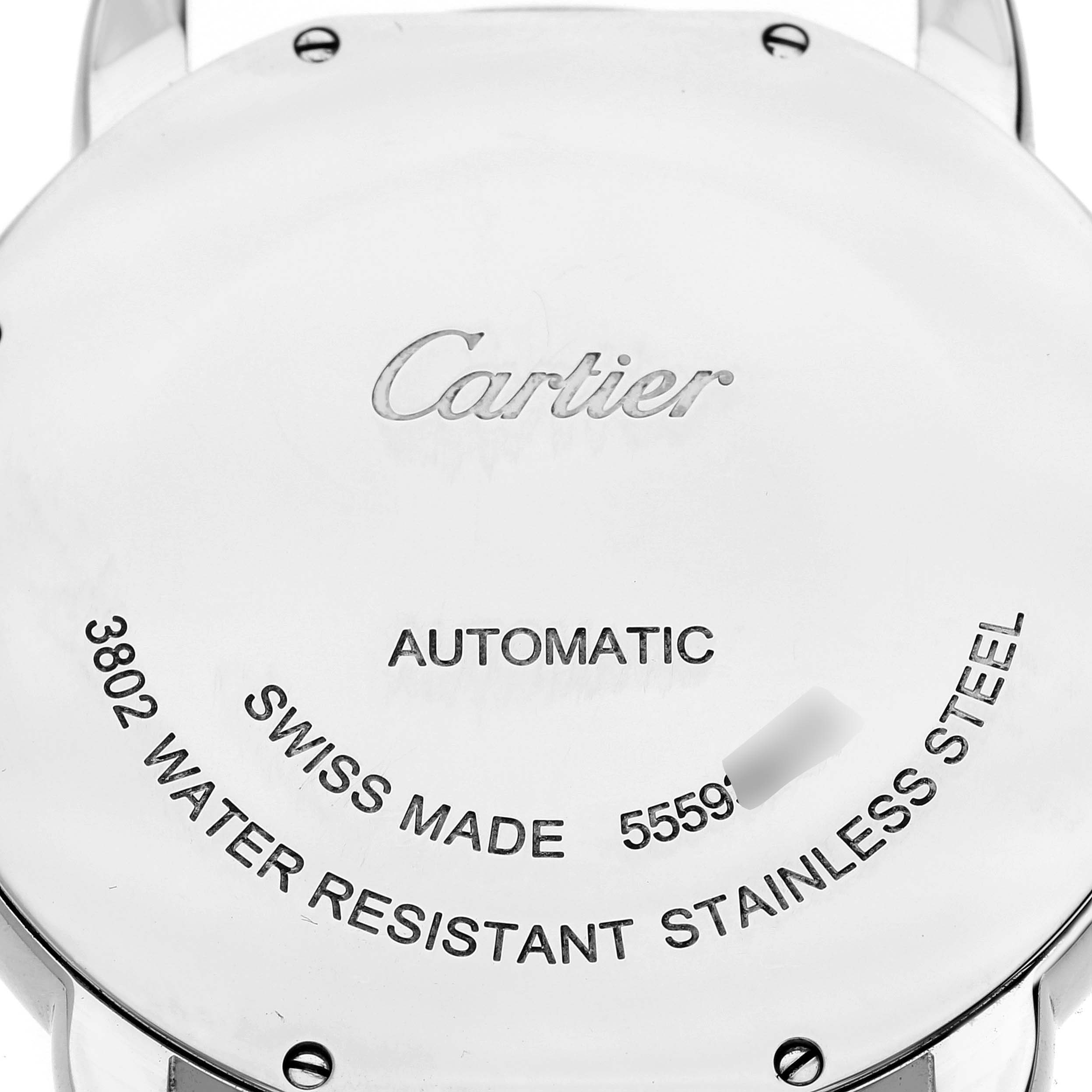 The image shows the back case of a Cartier Ronde W6701011 Men
s Stainless Steel Silver Dial W6701011 Men
s Stainless Steel Silver Dial watch, displaying inscriptions about its features and model.