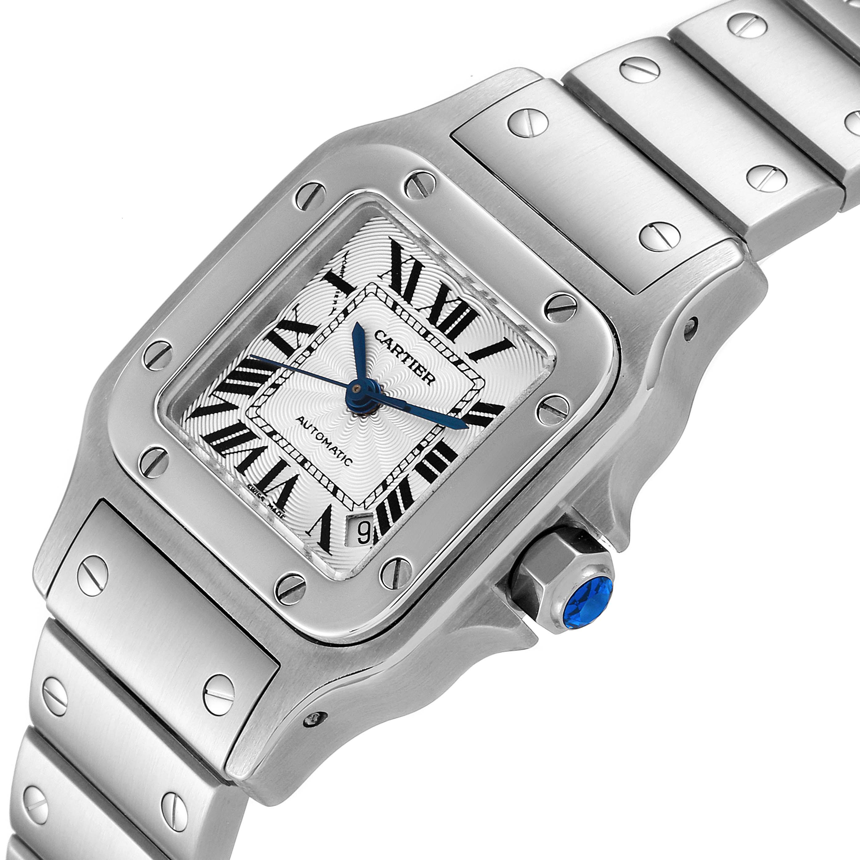 The image shows a close-up of the front and part of the stainless steel bracelet of a Cartier Santos W20044D6 Women's Stainless Steel Silver Dial W20044D6 Women's Stainless Steel Silver Dial watch.