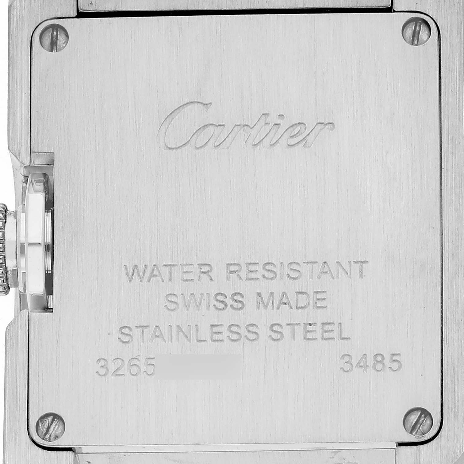 The image shows the back of a Cartier Tank Anglaise W5310022 Women
s Stainless Steel Silver Dial W5310022 Women
s Stainless Steel Silver Dial watch, highlighting engravings and the crown from the side.