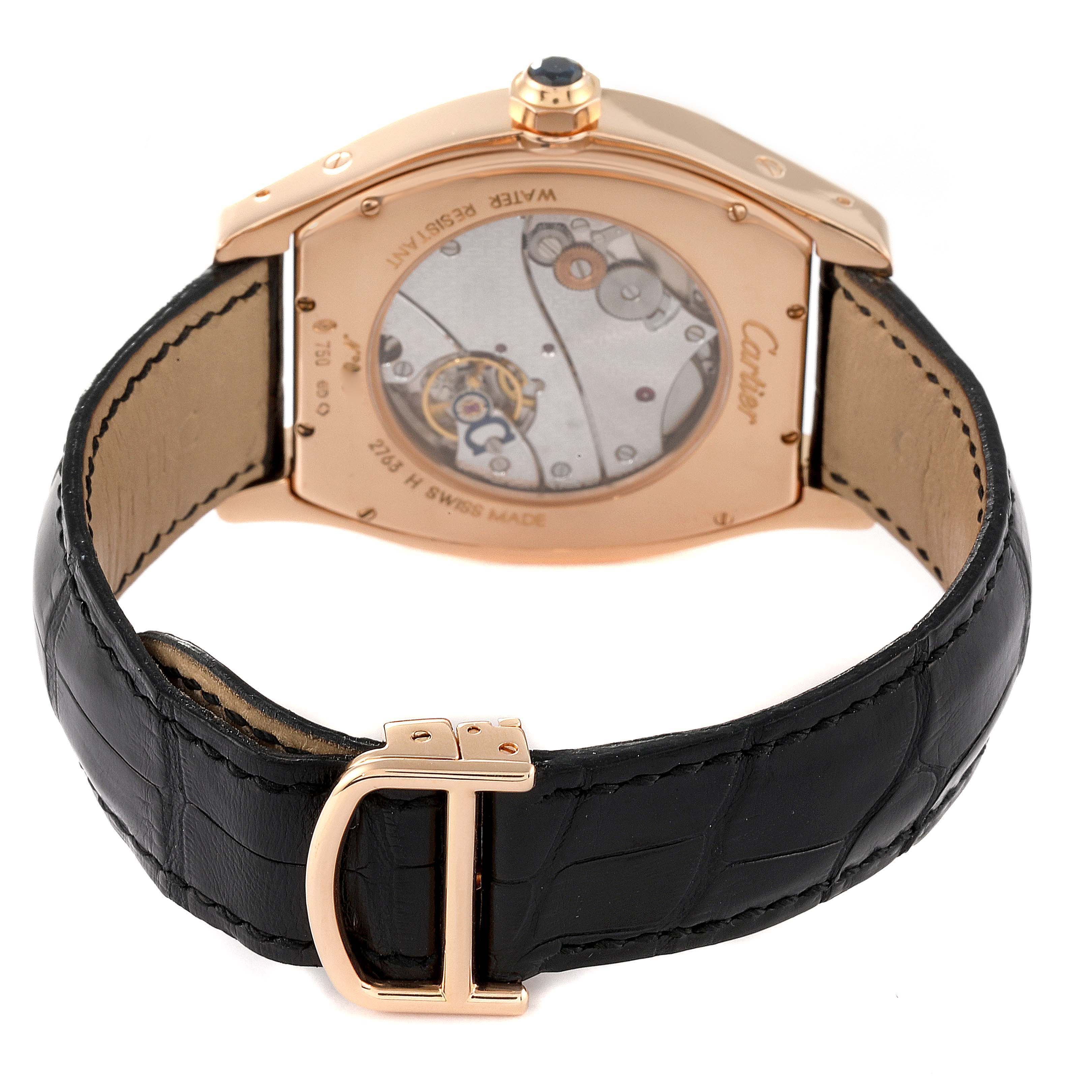 The image shows the back view of the Cartier Tortue W1546051 Men's Rose Gold Silver Dial W1546051 Men's Rose Gold Silver Dial watch, highlighting its movement and black leather strap with a buckle.