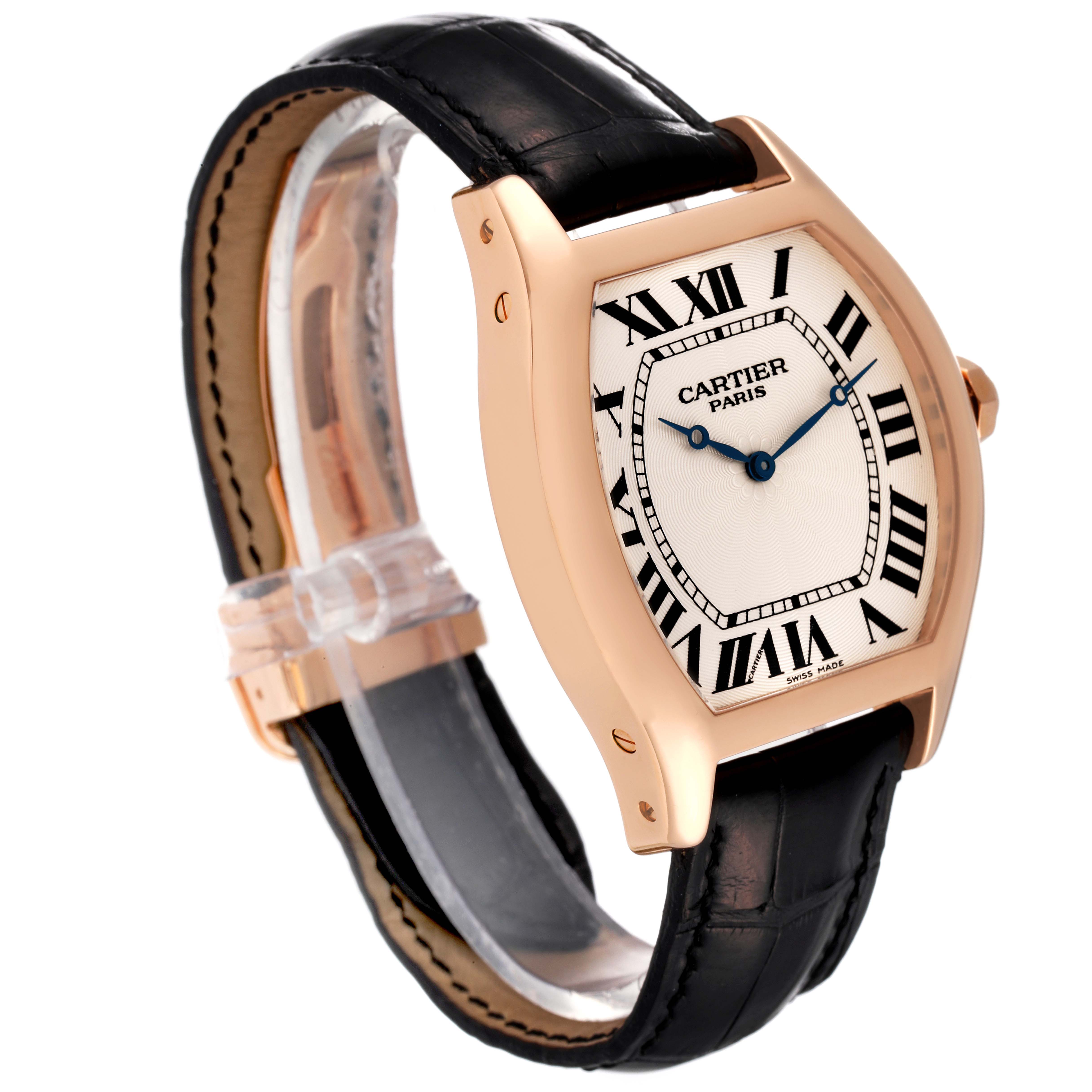 This image shows a side angle of the Cartier Tortue W1546051 Men's Rose Gold Silver Dial W1546051 Men's Rose Gold Silver Dial watch, focusing on its face, case, and black leather strap.